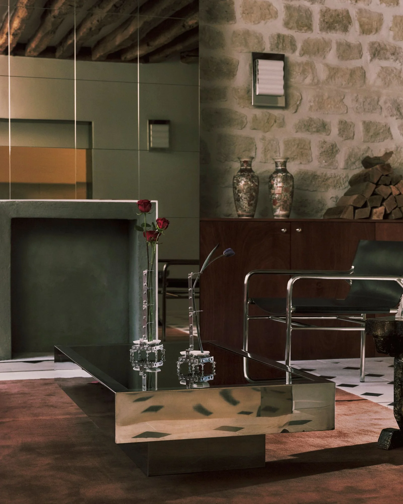 Image may contain Furniture Table Indoors Interior Design Architecture Building Living Room Room and Flower