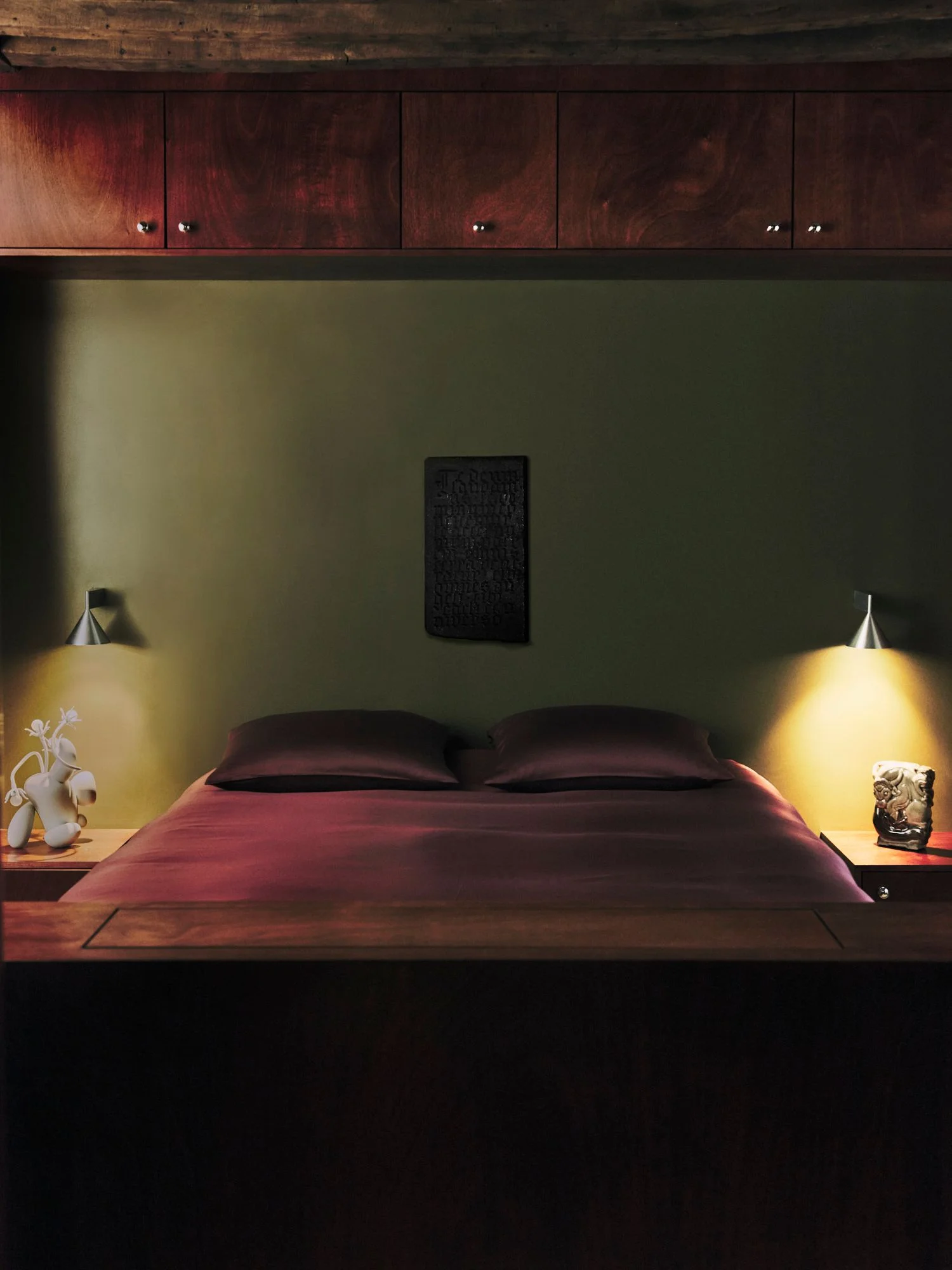 Image may contain Indoors Interior Design Furniture Lamp Bed Bedroom Room Hardwood Stained Wood and Wood