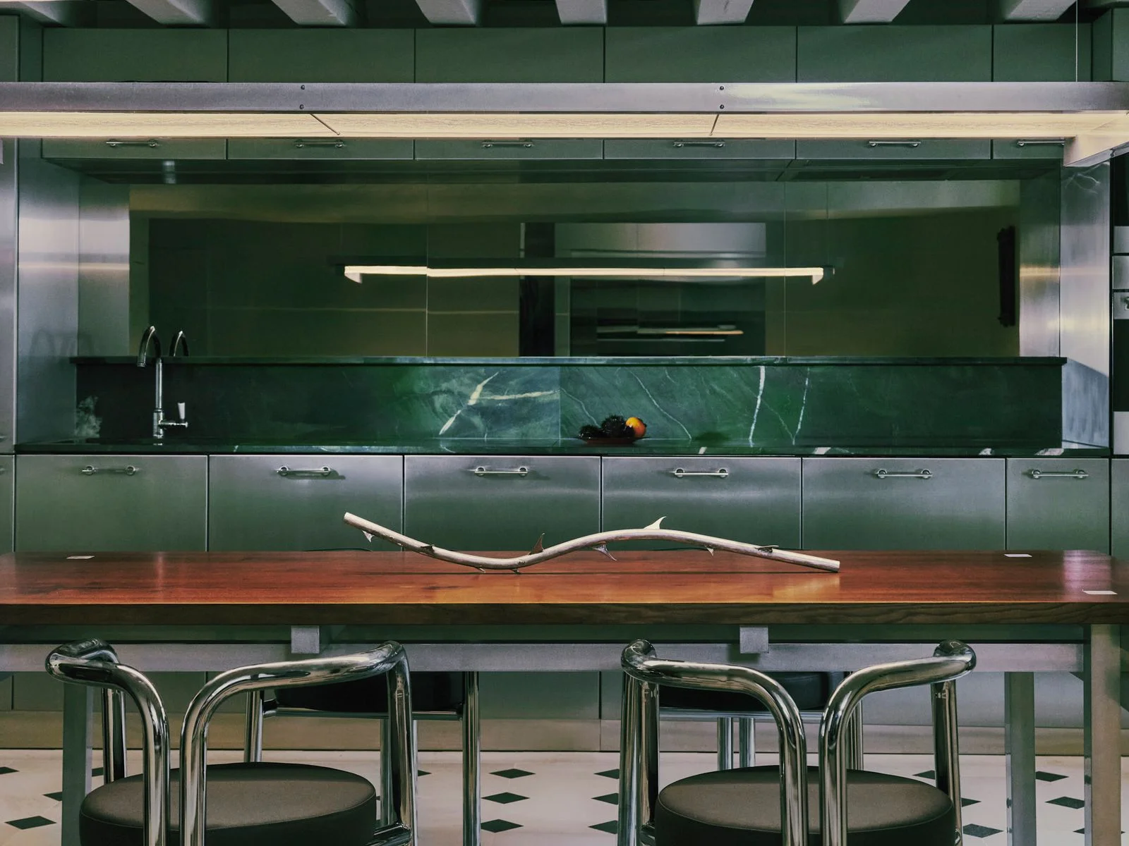 Image may contain Furniture Table Indoors Interior Design Restaurant Tabletop and Cafeteria