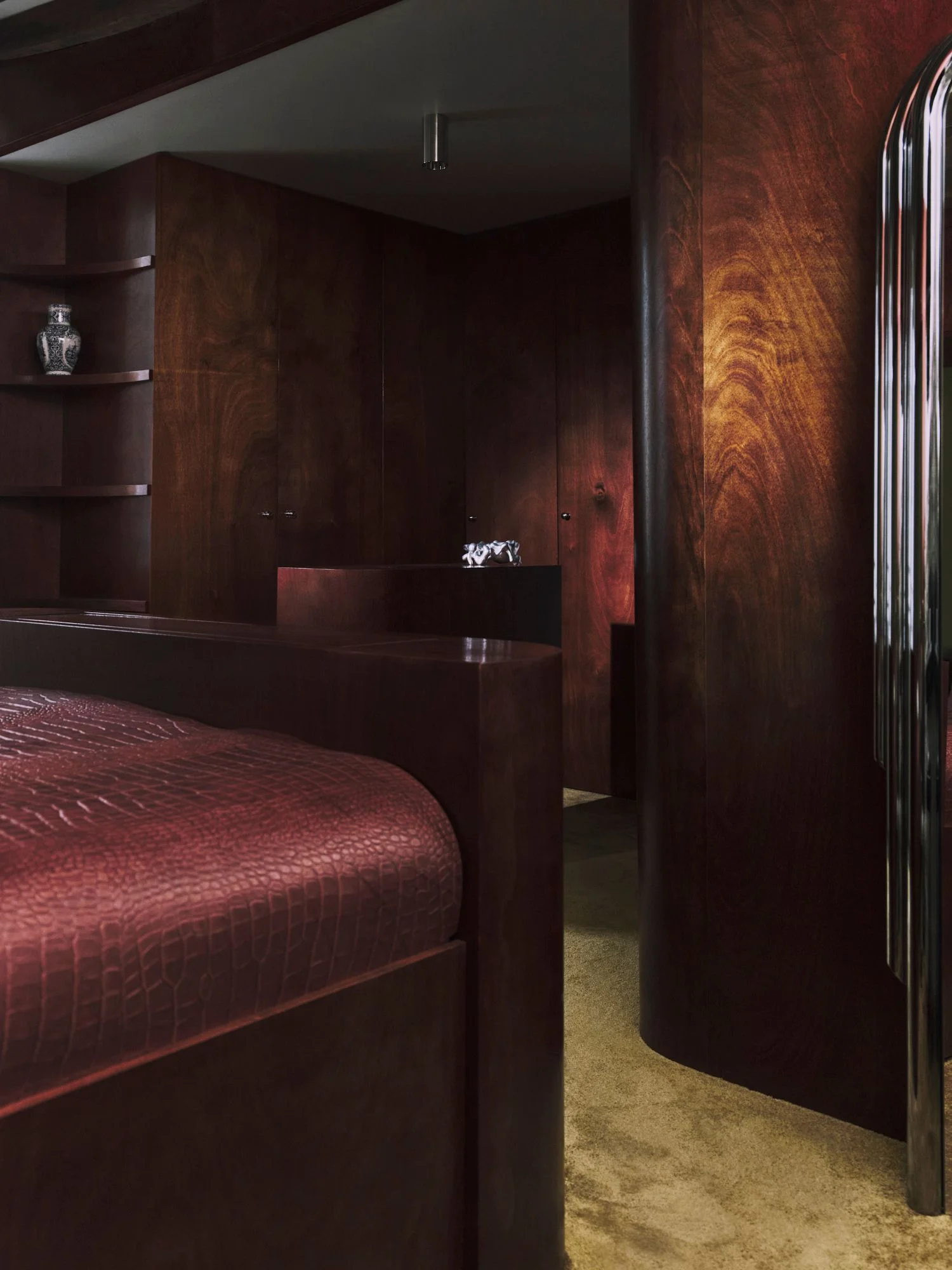 Image may contain Indoors Interior Design Wood Hardwood Stained Wood Bed Furniture Bedroom Dorm Room and Room