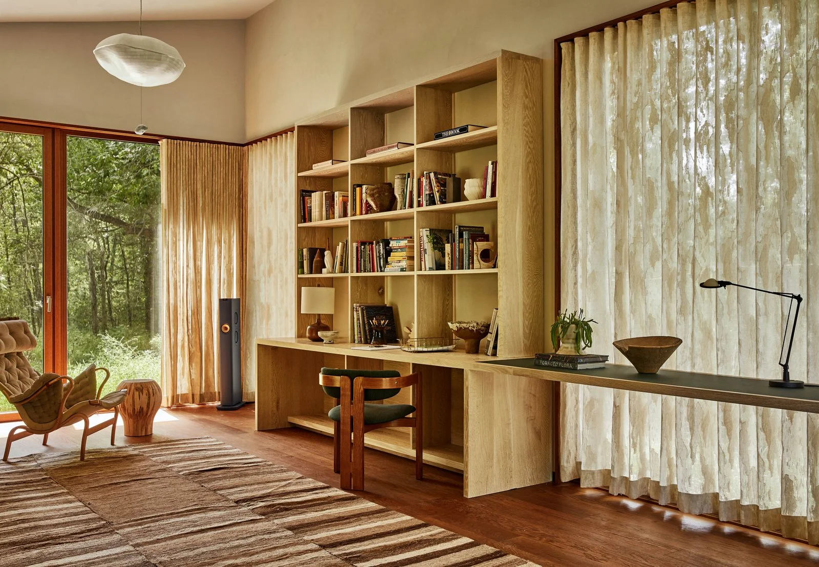 Image may contain Furniture Bookcase Wood Indoors and Interior Design