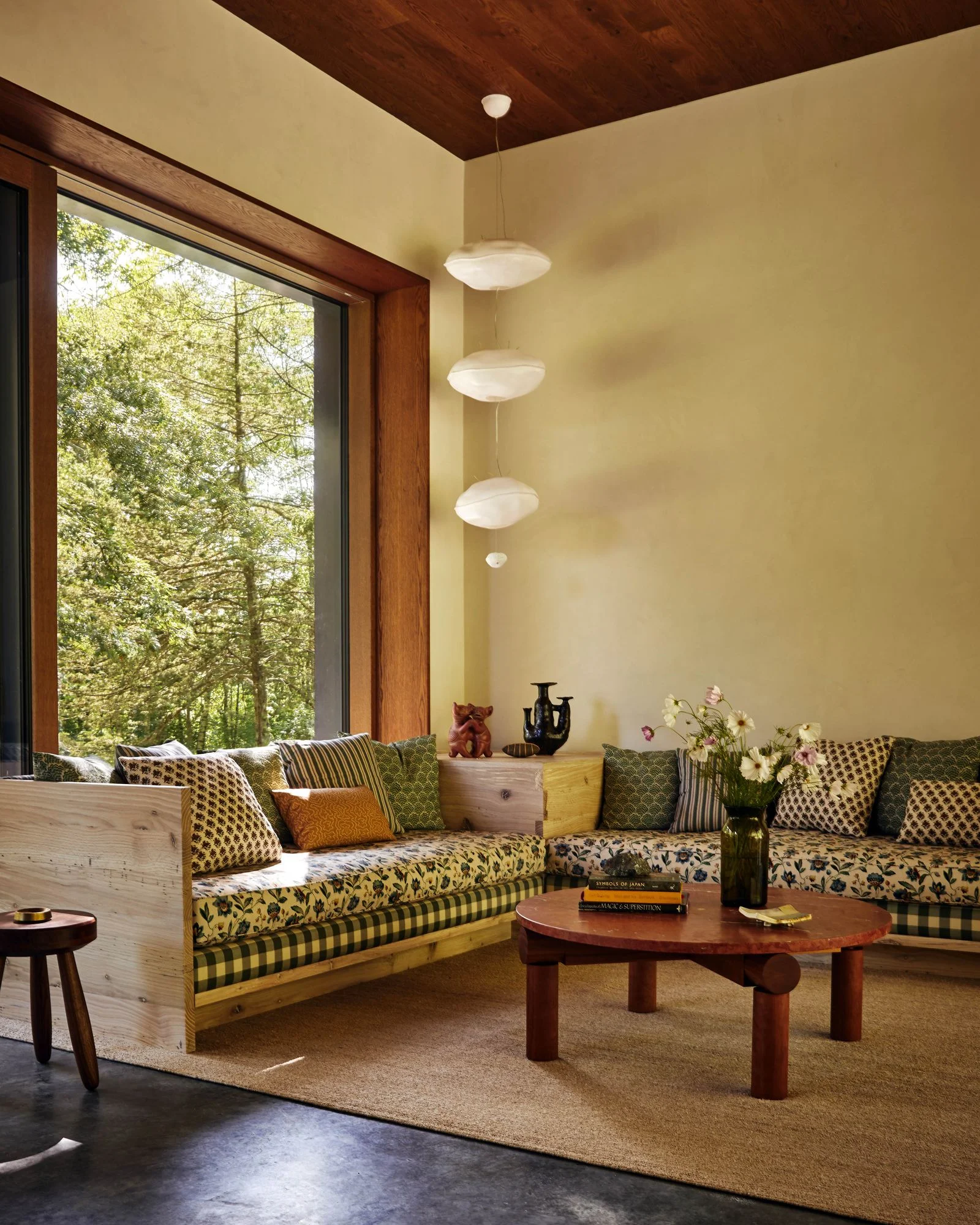 Image may contain Home Decor Coffee Table Furniture Table Indoors Interior Design Couch Architecture and Building