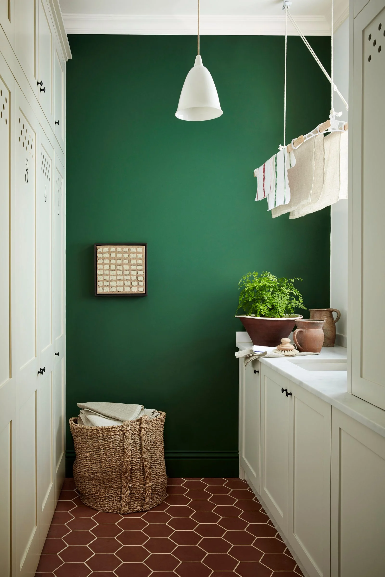 Figuring out how to hang laundry in small spaces requires a little innovation—but the task needn't be an eyesore.