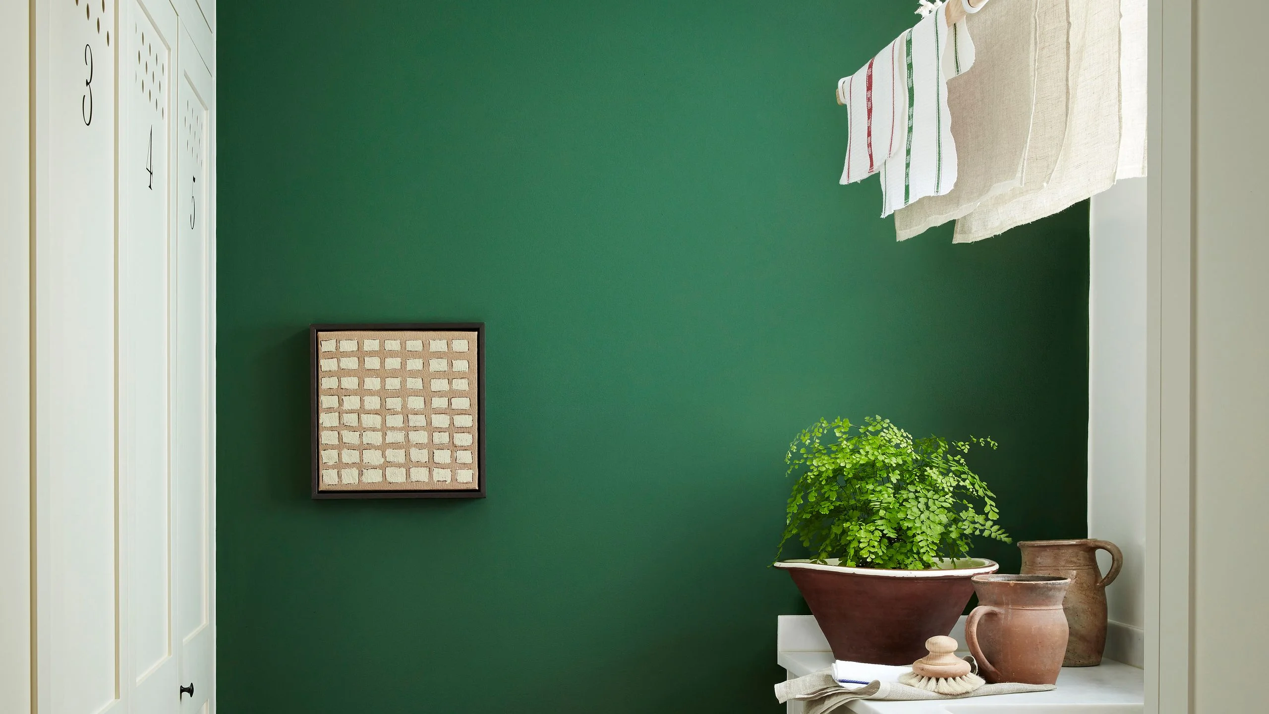 Figuring out how to hang laundry in small spaces requires a little innovation—but the task needn't be an eyesore.