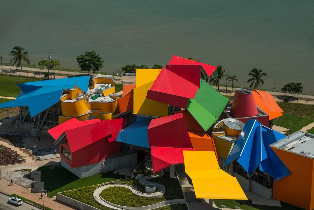 multi colored rooftop of building by the water