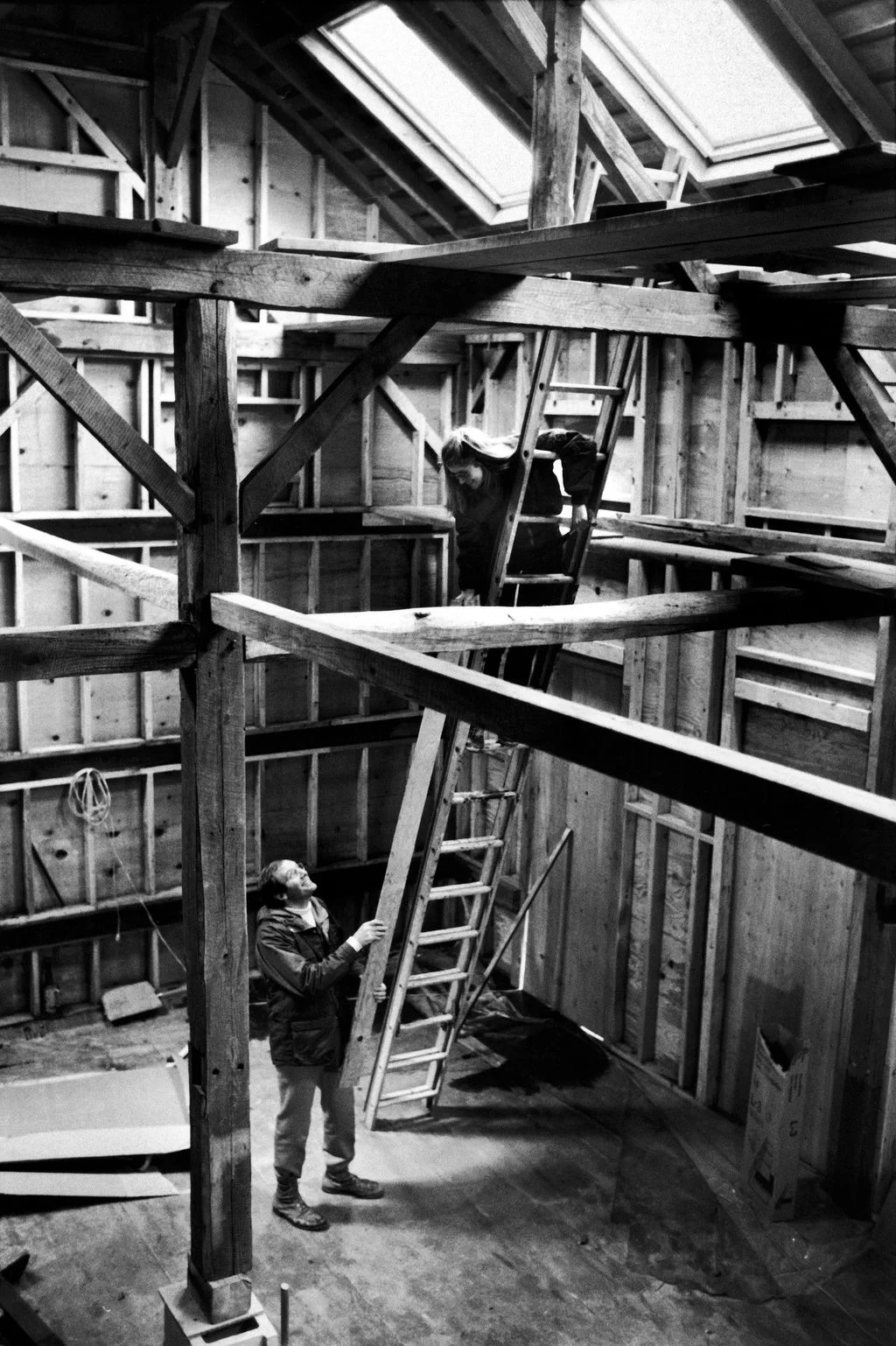 Image may contain Adult Person Clothing Hardhat Helmet Wood Footwear Shoe Worker Construction and Window