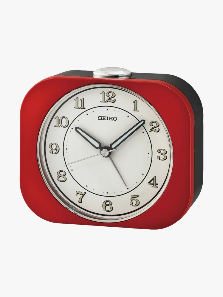 Image may contain: Alarm Clock, Clock, and Wristwatch