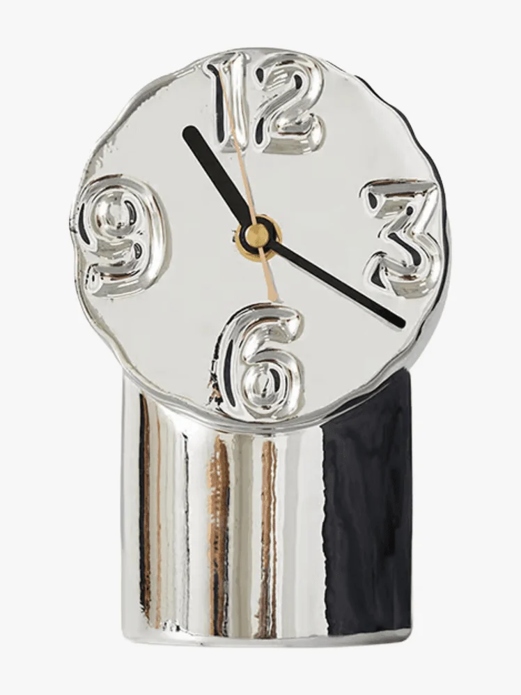 Image may contain: Clock, Analog Clock, Wall Clock, and Smoke Pipe