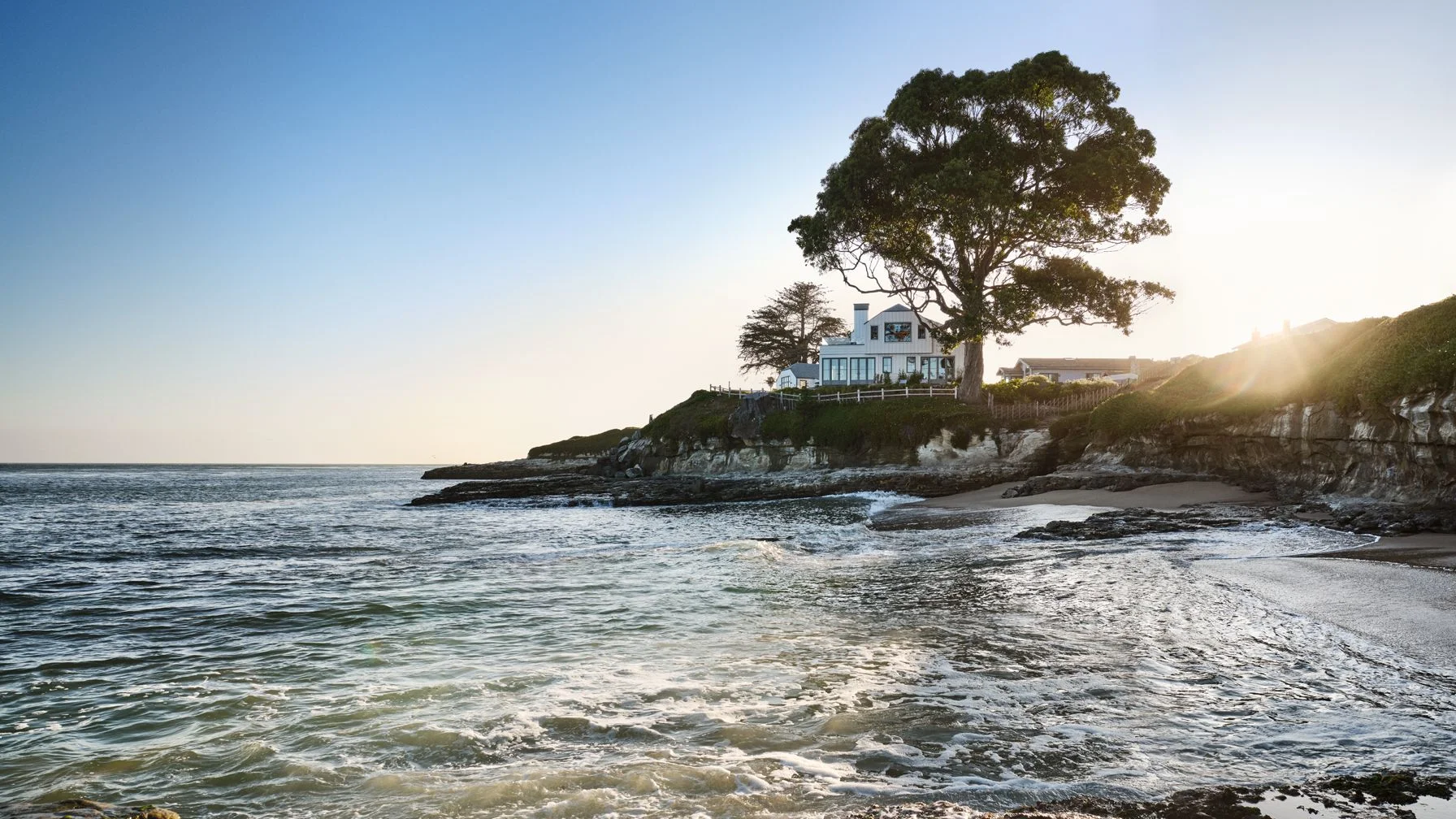 Image may contain Santa Cruz cottage Nature Outdoors Scenery Sea Water Beach Coast Shoreline and Rock