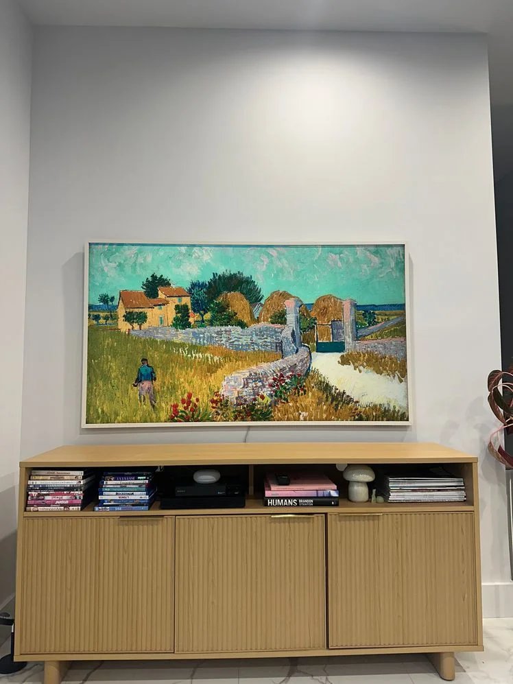 Image may contain: Indoors, Interior Design, Art, Painting, Furniture, Sideboard, Computer Hardware, and Electronics