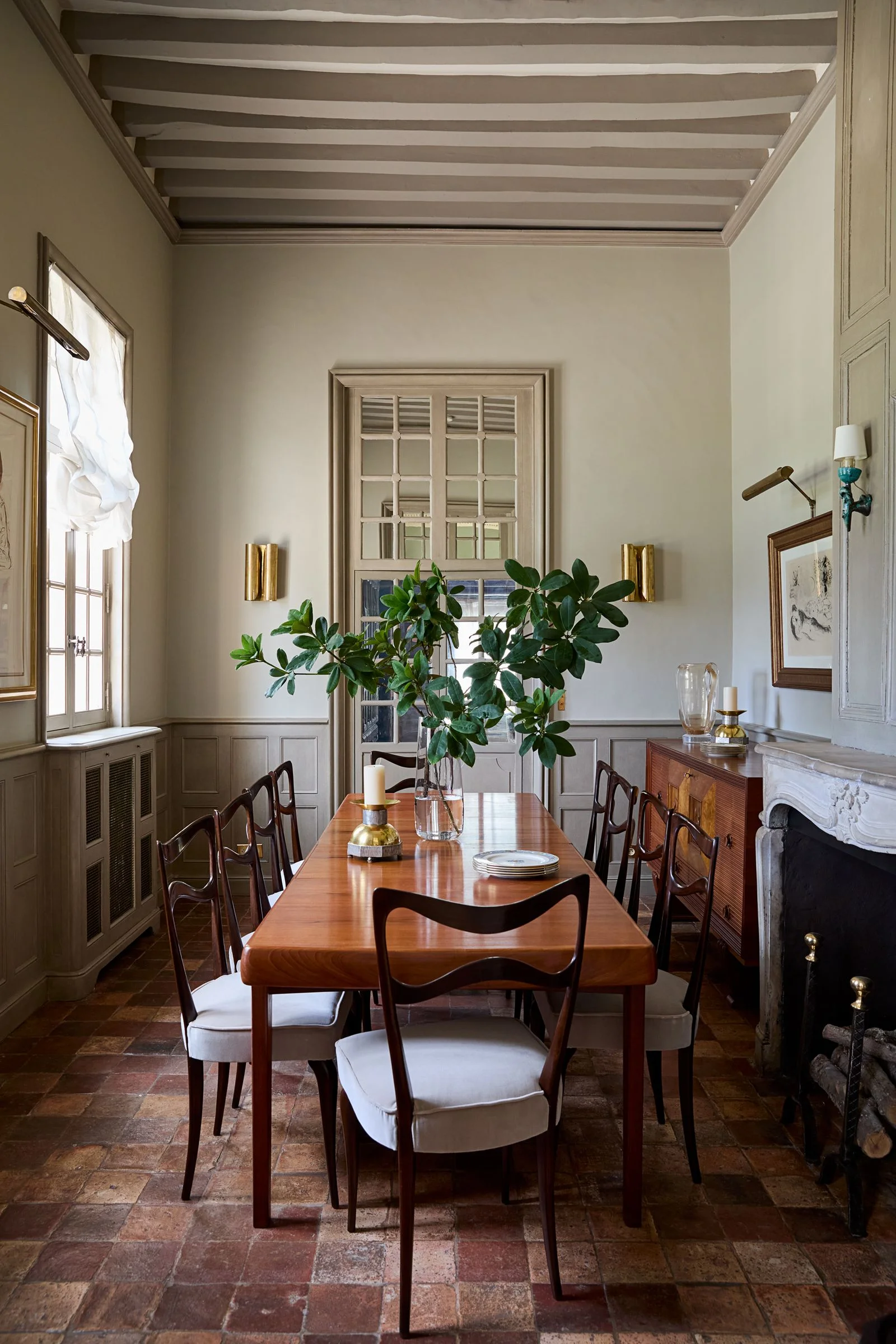 Image may contain Architecture Building Dining Room Dining Table Furniture Indoors Room Table and Interior Design