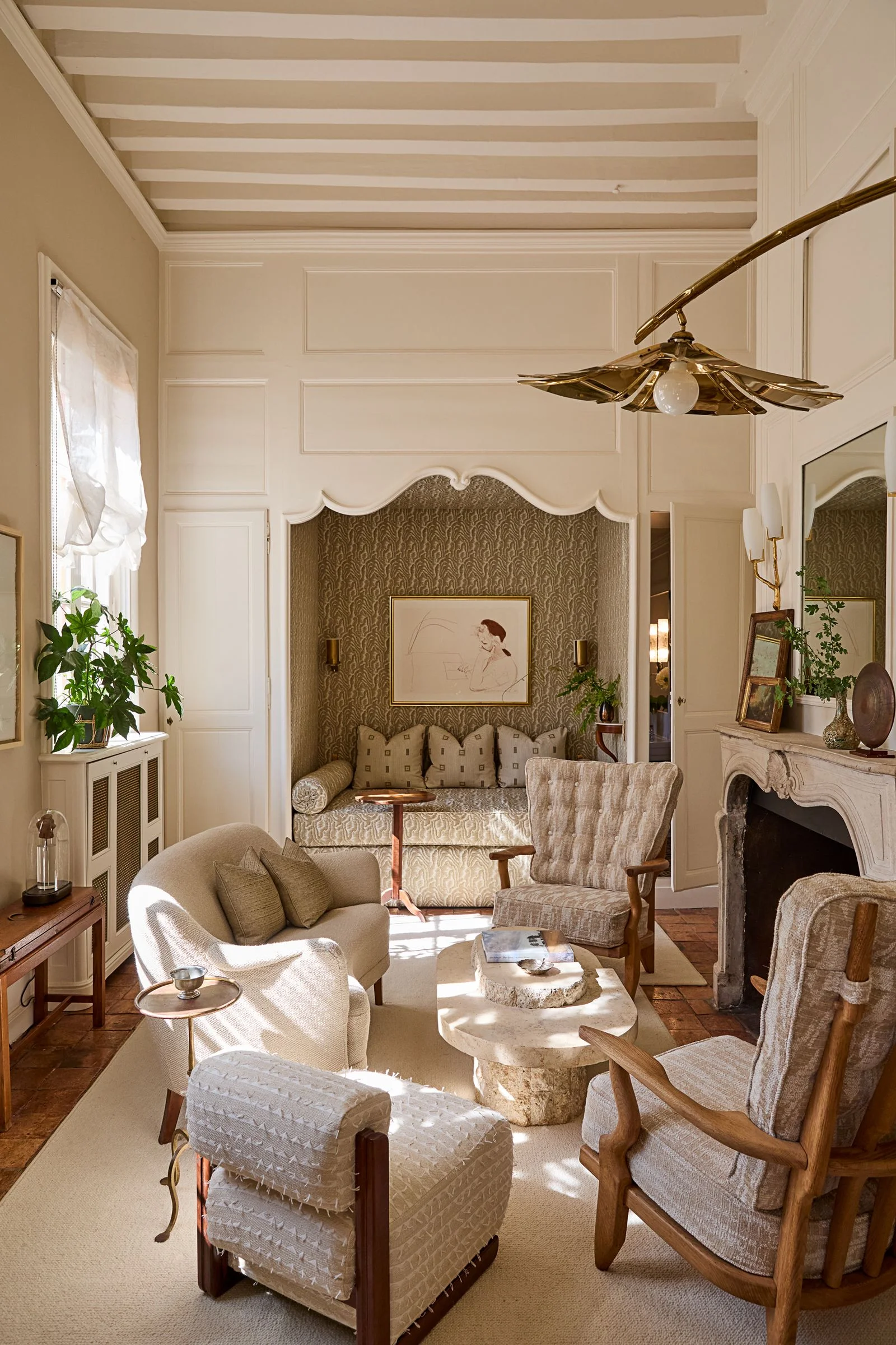 Image may contain Home Decor Furniture Table Plant Architecture Building Indoors Living Room Room and Appliance