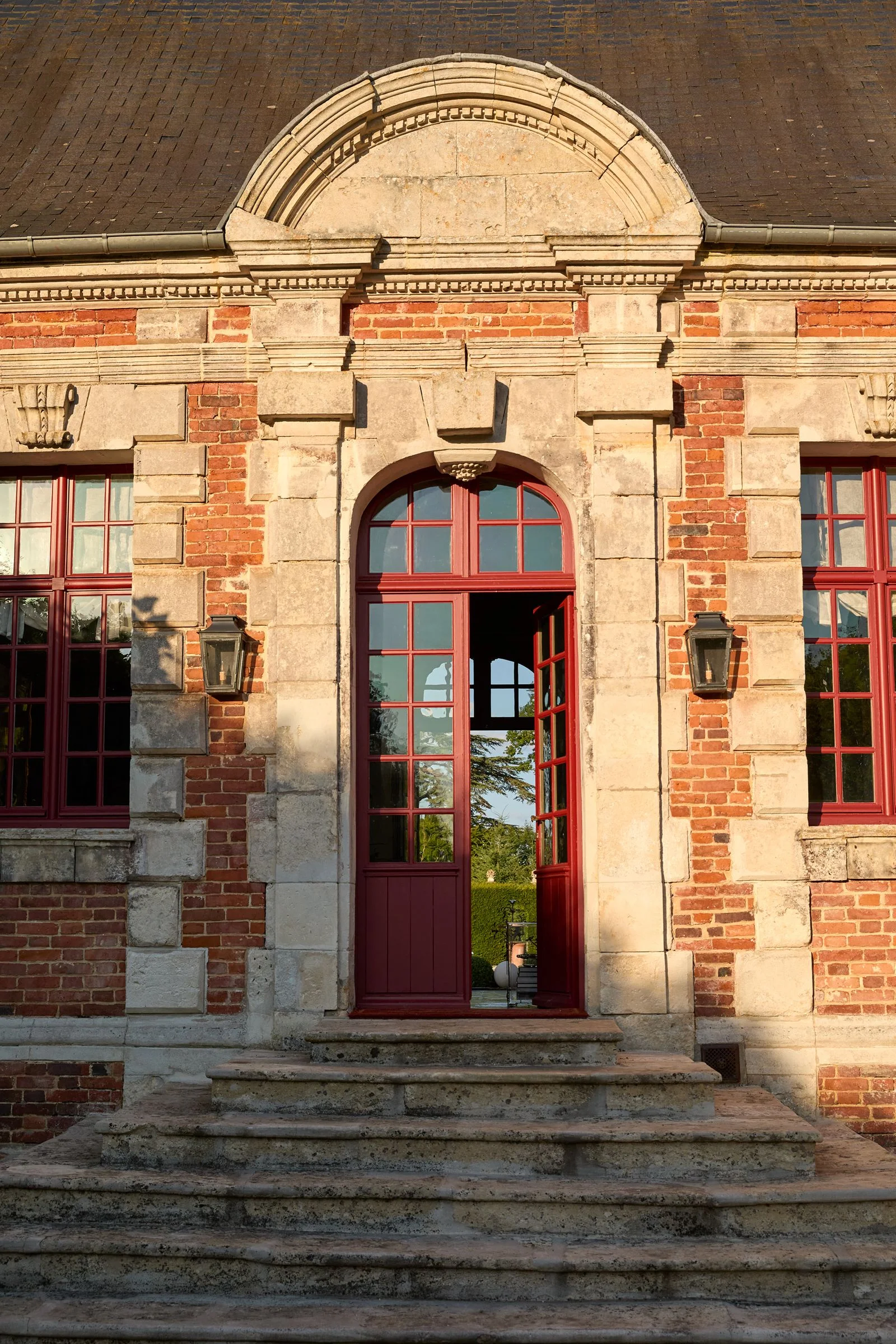Image may contain Door French Window Window Arch Architecture Building Housing and House