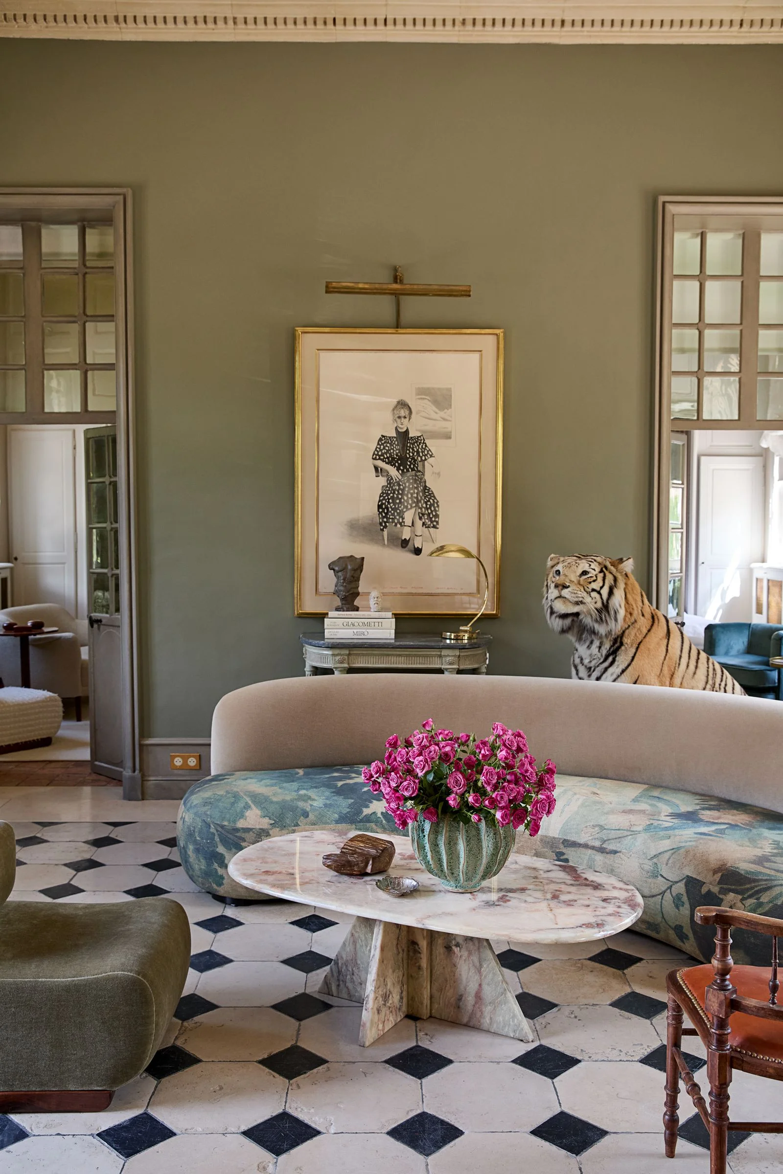 Image may contain Plant Potted Plant Home Decor Furniture Table Architecture Building Dining Room and Dining Table