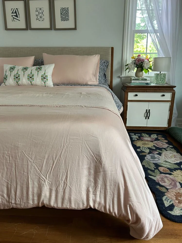 Image may contain: Furniture, Lamp, Bed, Home Decor, Bed Sheet, Art, Painting, and Rug