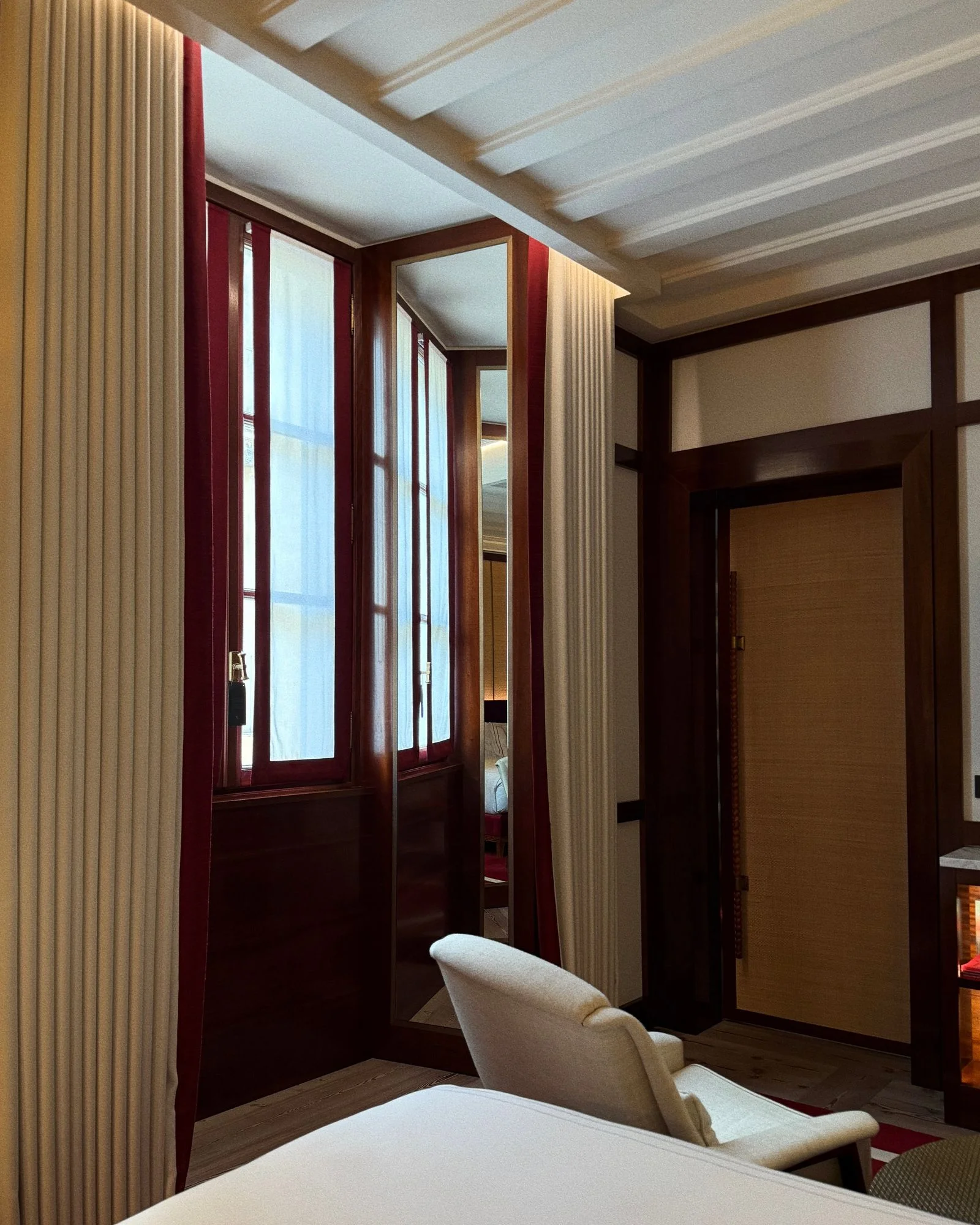 Image may contain Indoors Interior Design Door Chair Furniture Bed Architecture Building and Housing