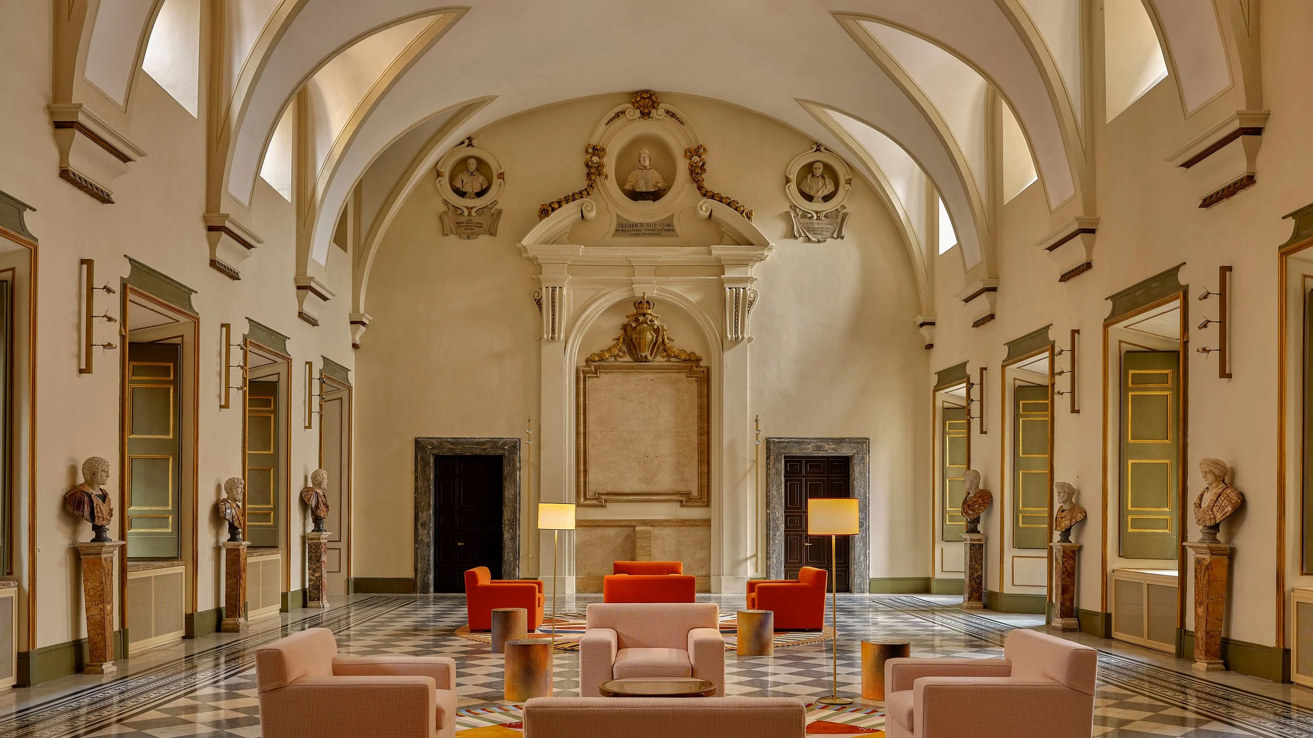 Image may contain Home Decor Indoors Person Architecture Building Foyer Chair and Furniture