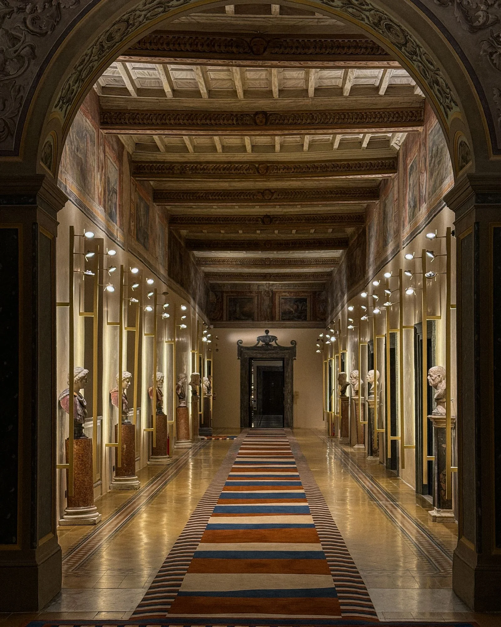 Image may contain Indoors Floor Person Architecture Building and Corridor