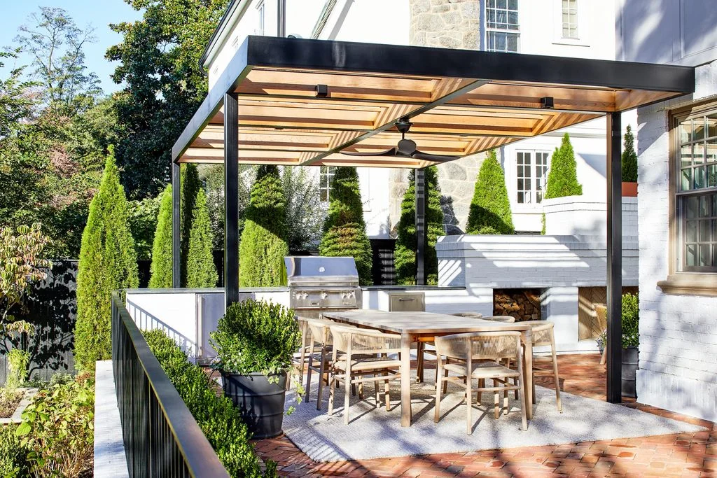 Image may contain Indoors Interior Design Architecture Building House Housing Porch Patio and Dining Table