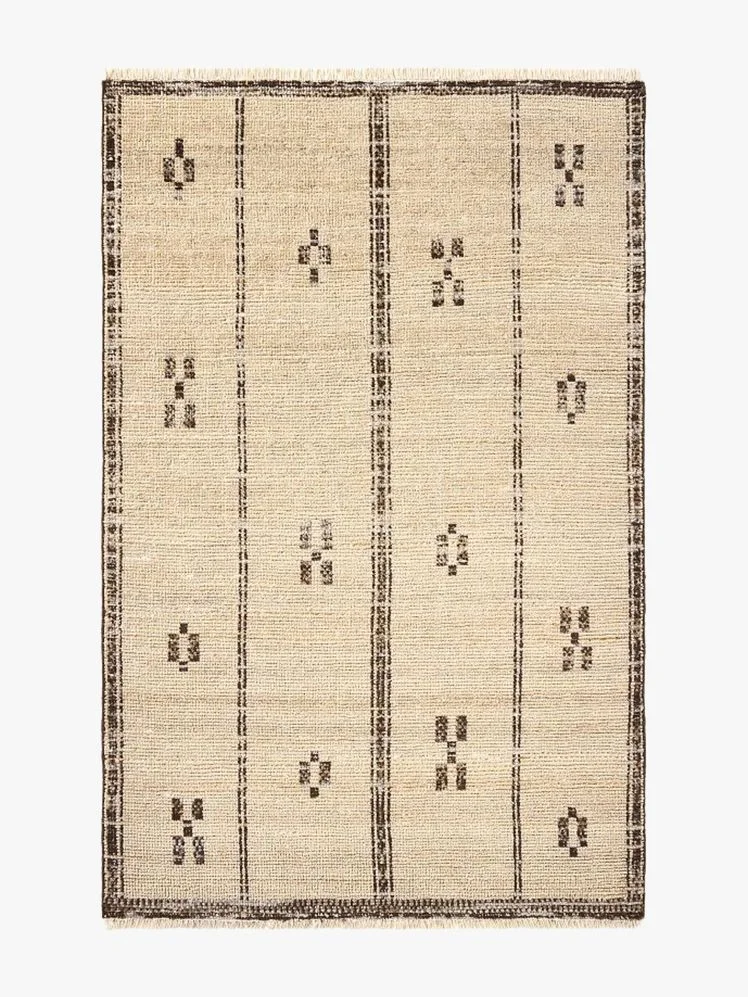 Image may contain: Home Decor, Rug, Architecture, and Building