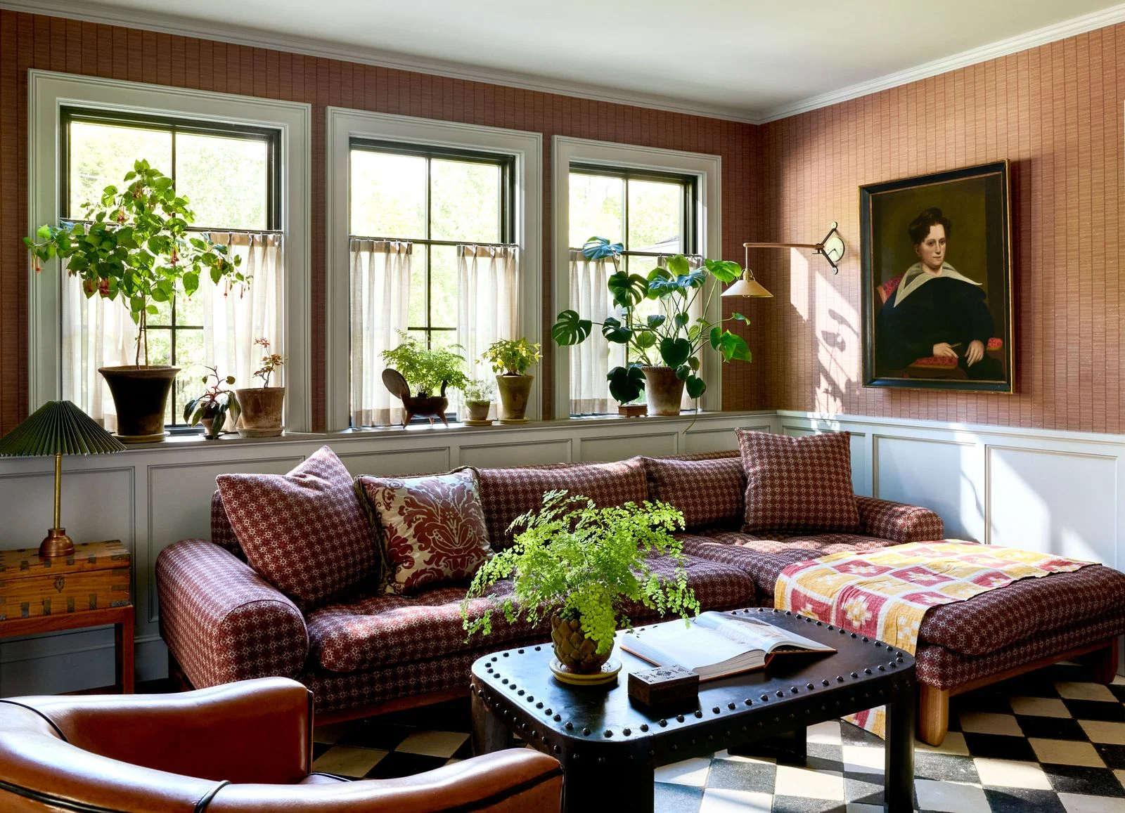 Image may contain Couch Furniture Architecture Building Indoors Living Room Room Plant Home Decor Window and Table