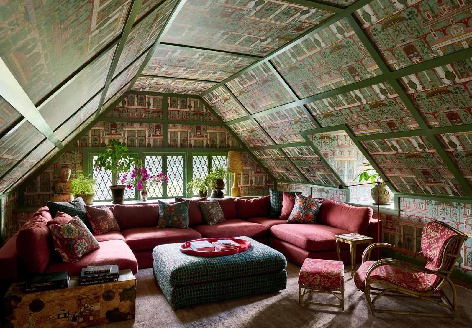 Image may contain Furniture Home Decor Couch Plant and Table