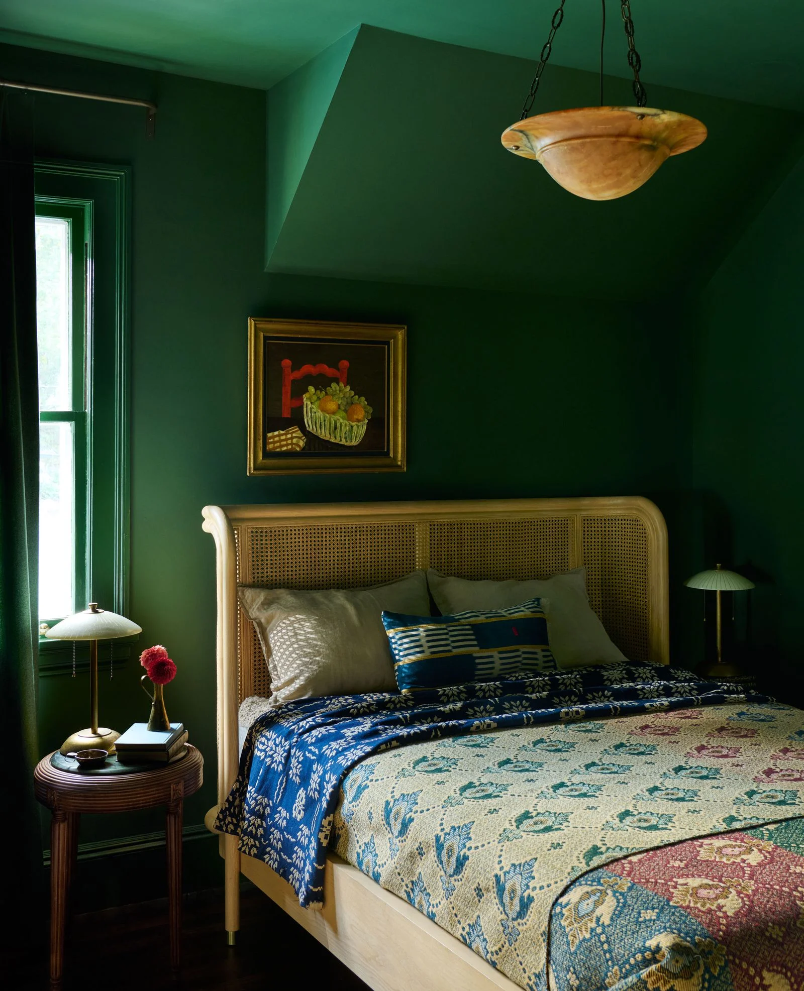 Image may contain Indoors Interior Design Lamp Bed Furniture Home Decor Cushion Bedroom and Room