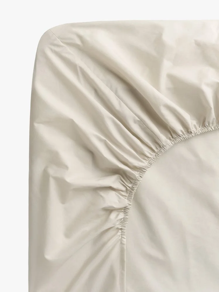 Image may contain: Cushion, Home Decor, Clothing, Hat, Pillow, Bonnet, and Furniture