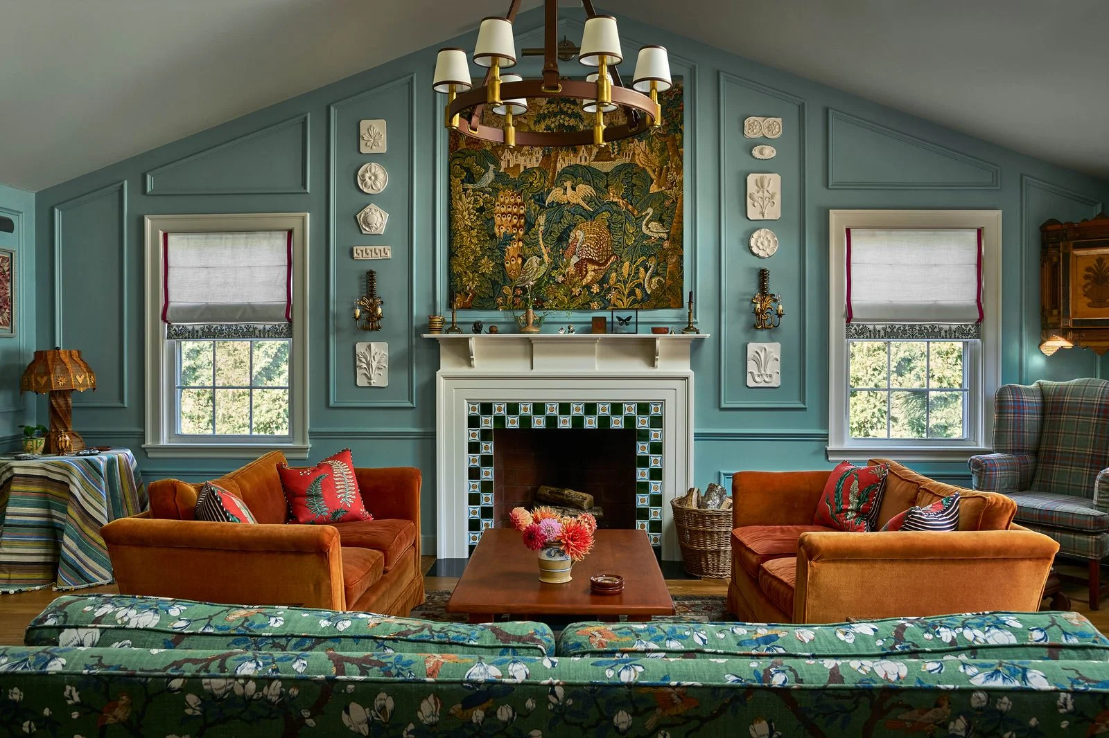 Image may contain Home Decor Fireplace Indoors Furniture Table Architecture Building Living Room Room and Hearth