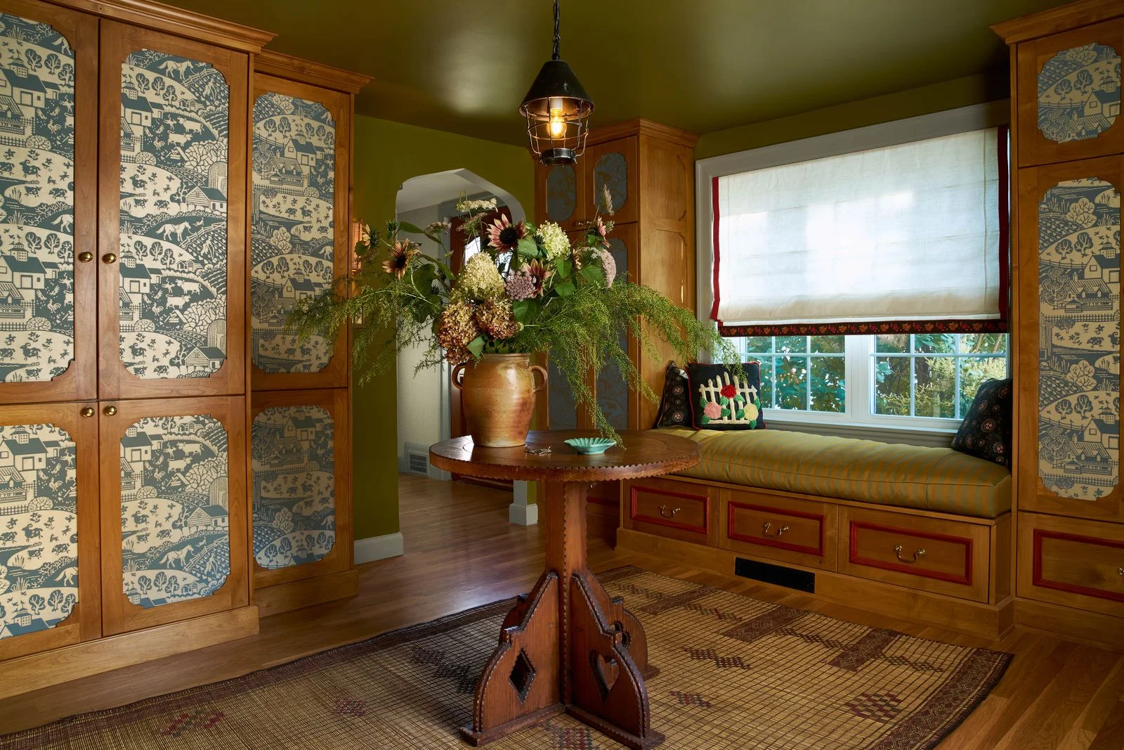 Image may contain Furniture Table Flower Flower Arrangement Plant Potted Plant Indoors Interior Design and Lamp