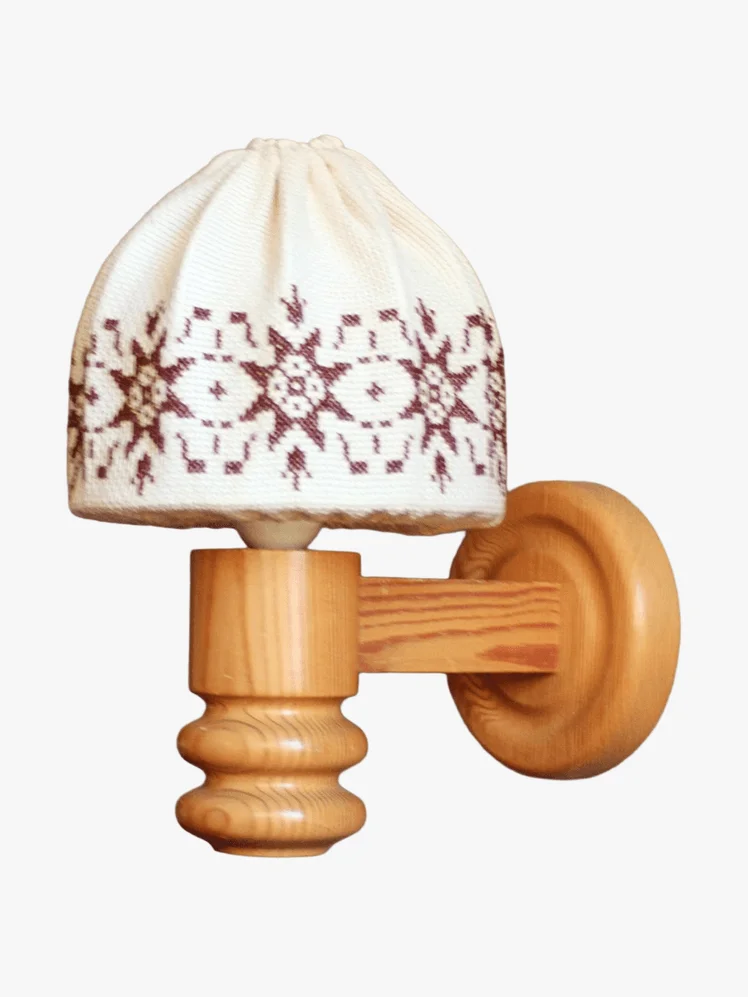 Image may contain: Clothing, Hat, Lamp, Toy, Smoke Pipe, and Rattle