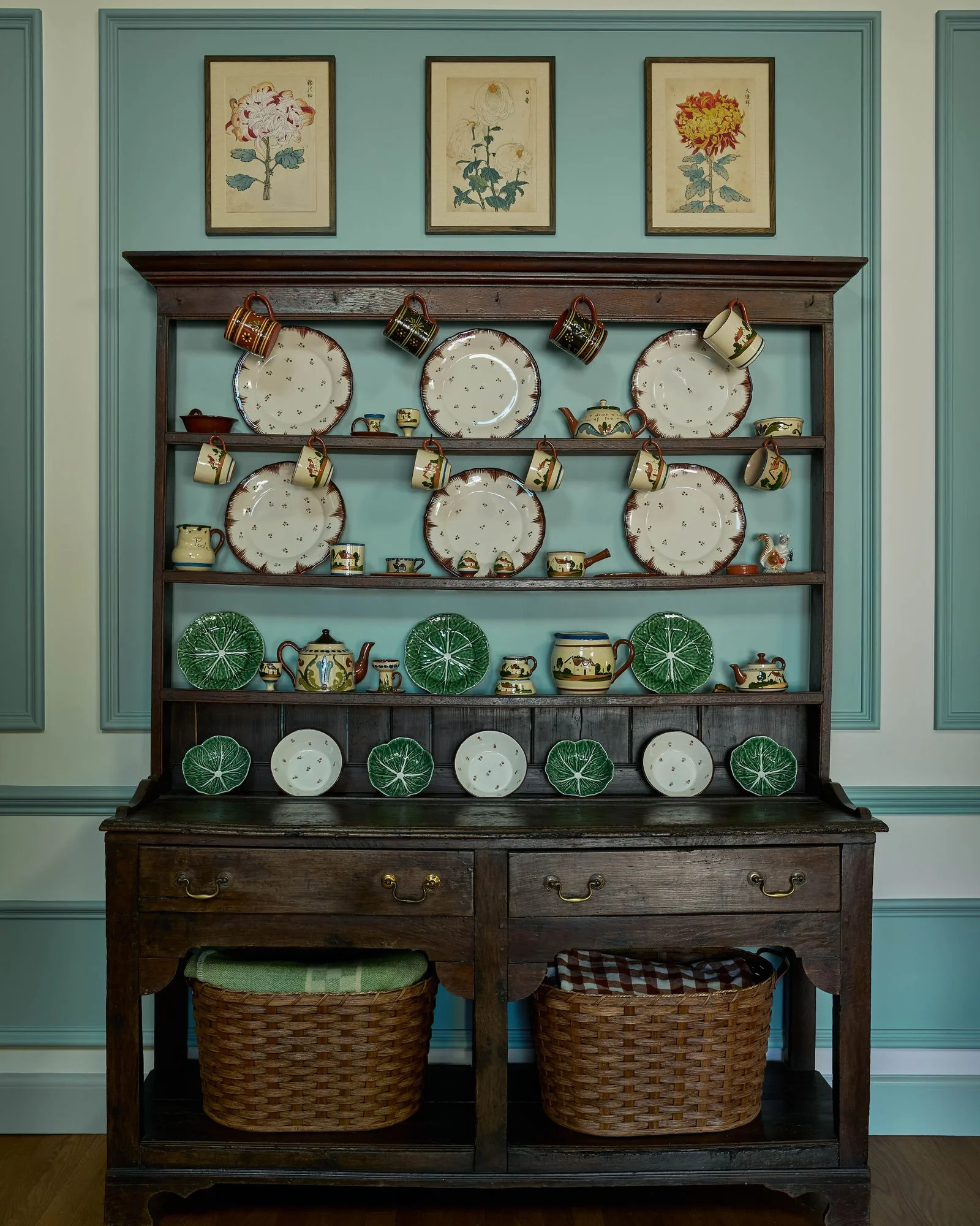 Image may contain Furniture Cup Cabinet Hockey Ice Hockey Ice Hockey Puck Rink Skating Sport Plate and Sideboard