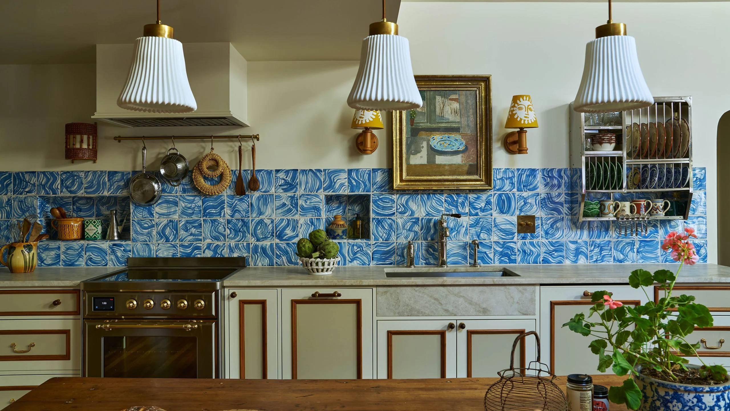 Image may contain home renovation Meta Coleman Indoors Interior Design Sink Sink Faucet Lamp and Kitchen