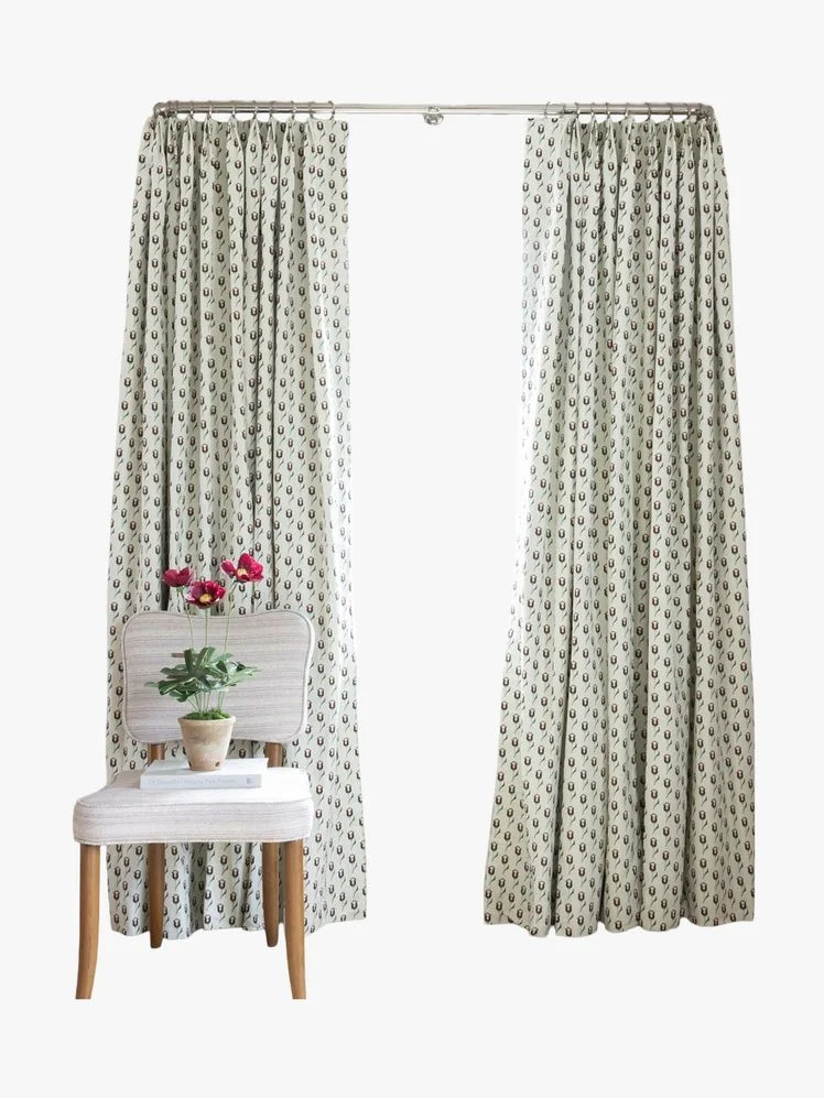 Image may contain: Curtain, Texture, Plant, Chair, and Furniture