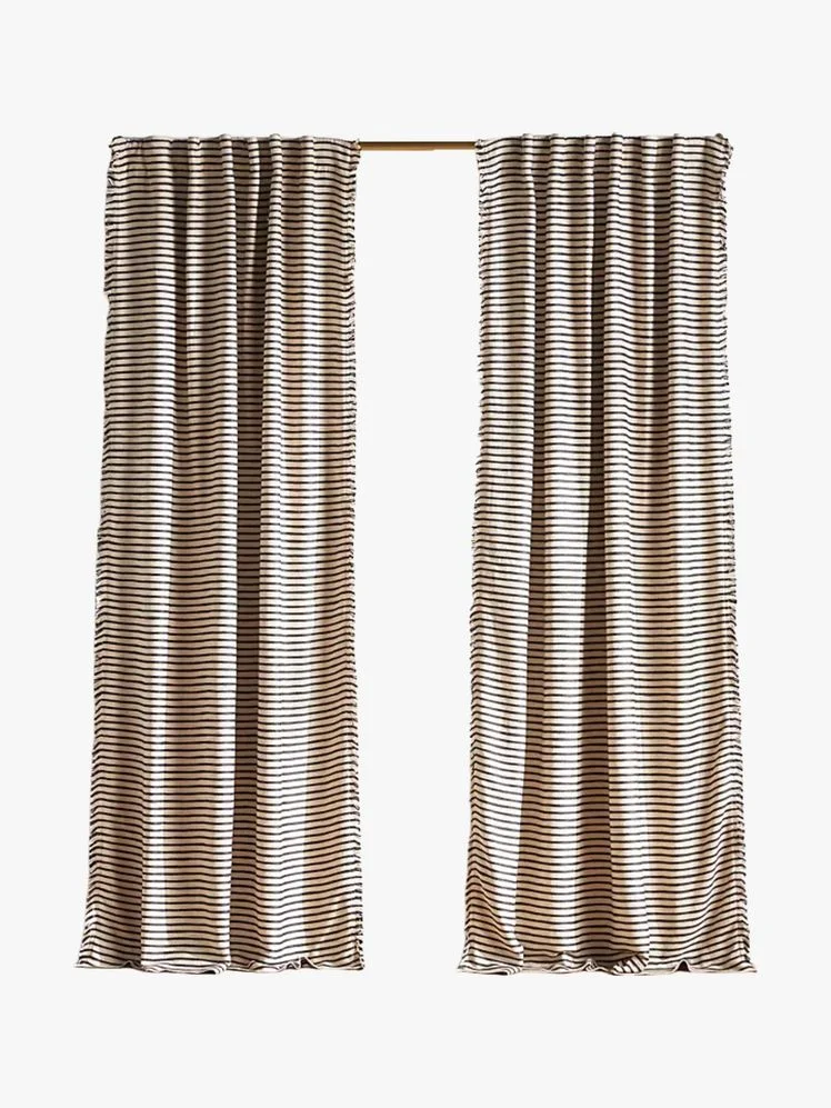 Image may contain: Curtain, Home Decor, Linen, and Texture