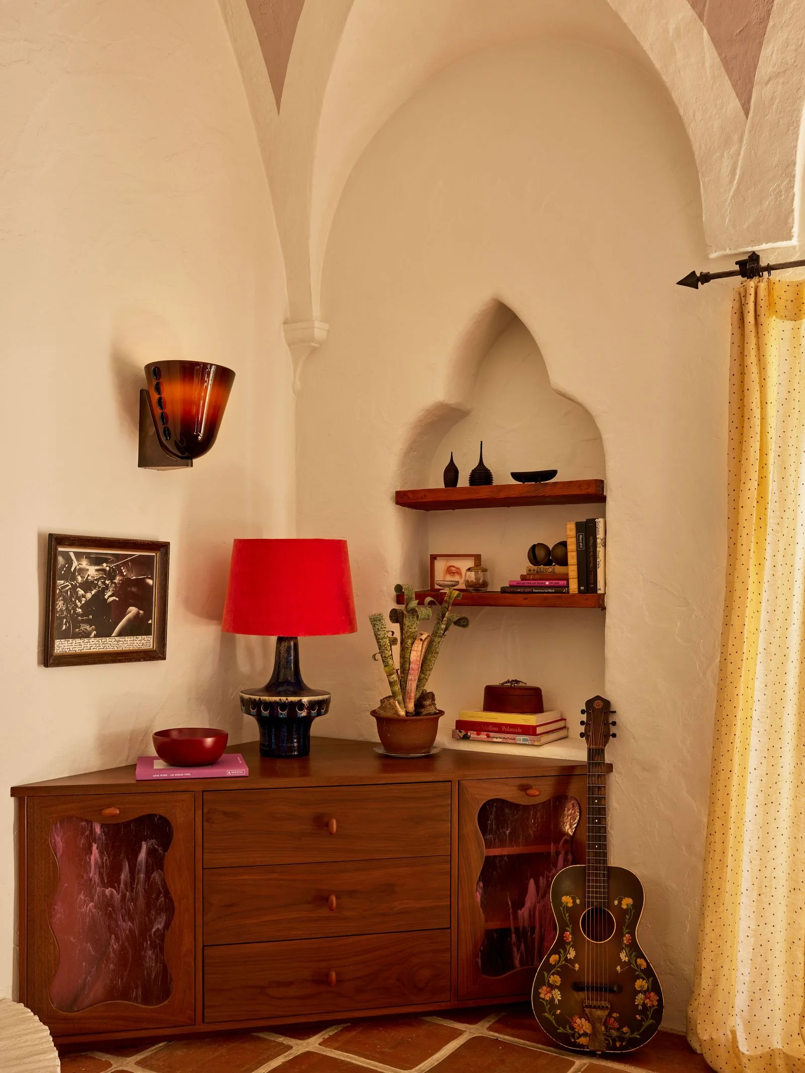 Image may contain Lamp Guitar Musical Instrument Furniture Indoors and Interior Design