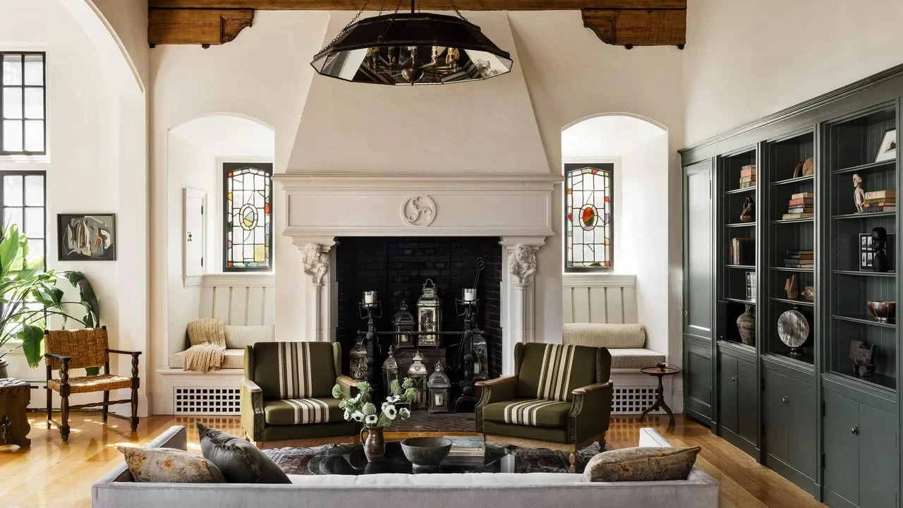 Image may contain Home Decor Architecture Building Furniture Indoors Living Room Room Chair Plant and Accessories