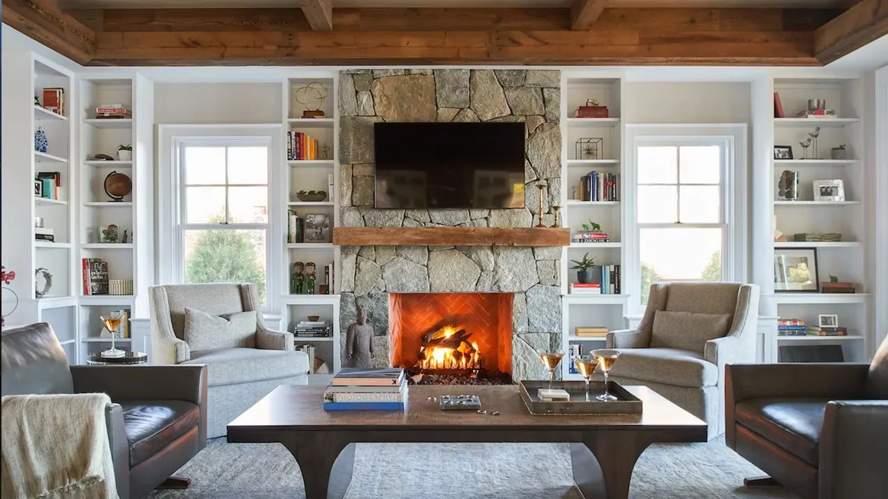 Image may contain Fireplace Indoors Home Decor Hearth Plant Interior Design Architecture Building and Furniture