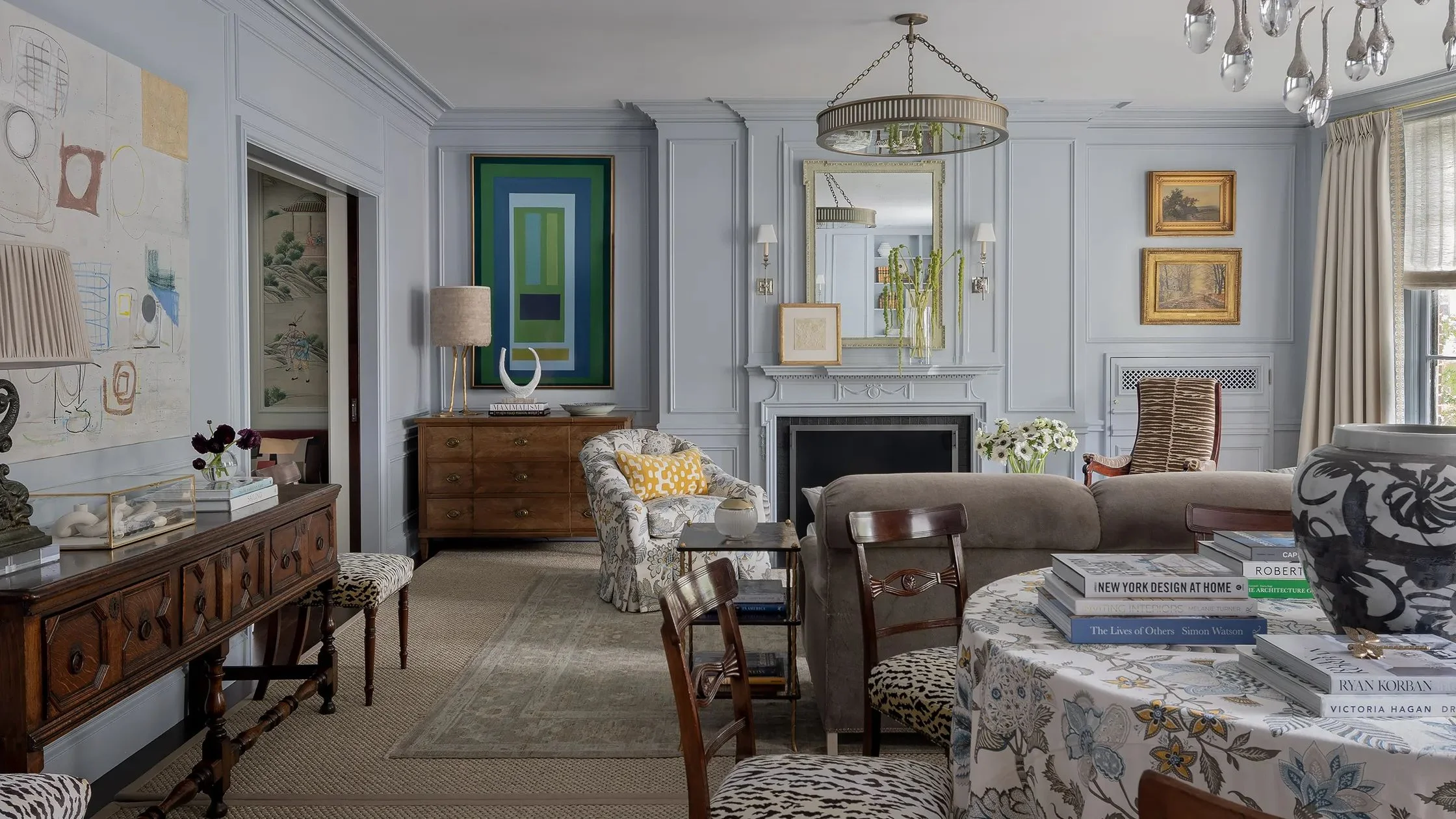 Image may contain Home Decor Lamp Chair Furniture Table Architecture Building Indoors Living Room Room and Desk