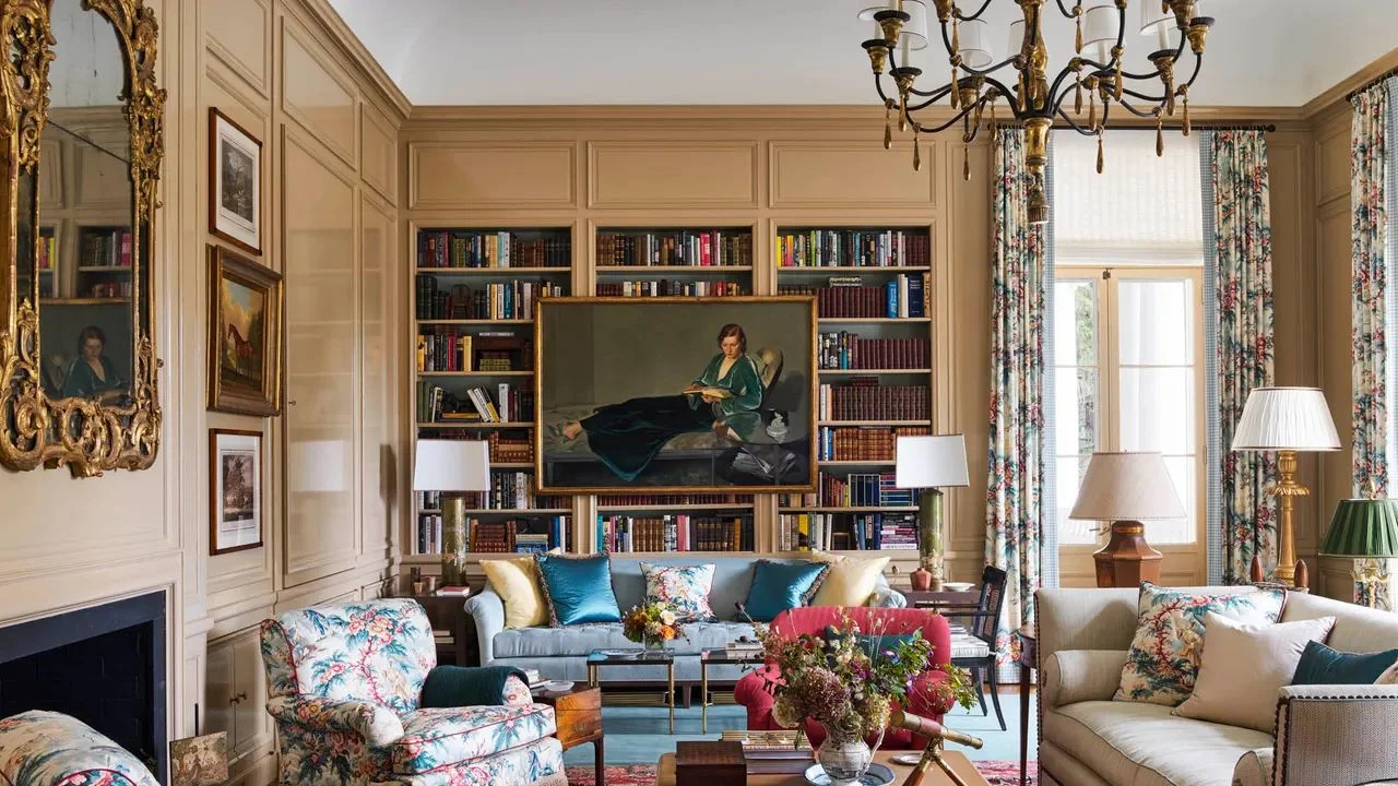 Image may contain Home Decor Lamp Couch Furniture Chair Person Art Painting Architecture Building and Indoors