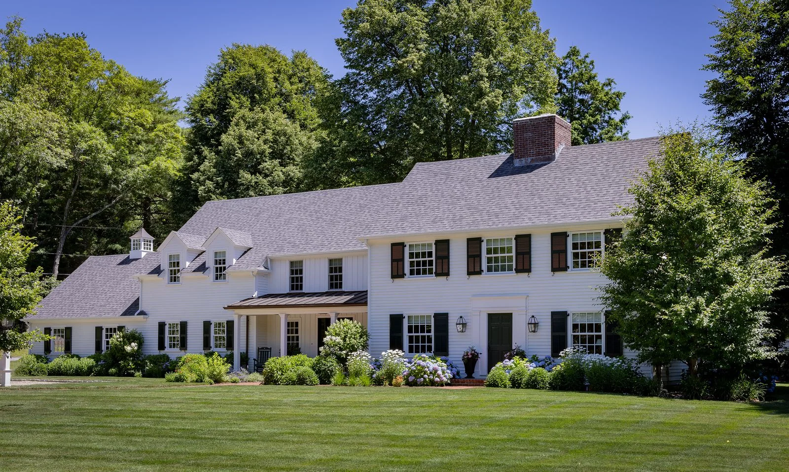 Image may contain Grass Plant Lamp Lawn Architecture Building Housing House Manor and Outdoors