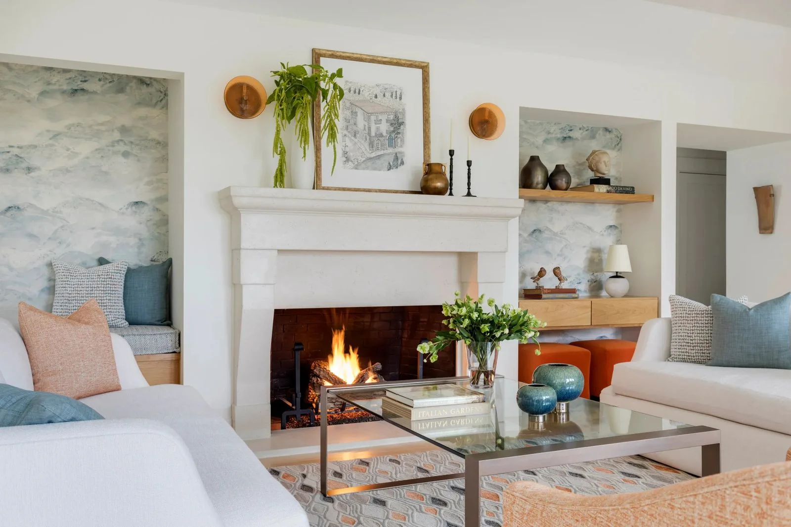 Image may contain Home Decor Fireplace Indoors Furniture Table Plant Couch Cushion Art Painting and Hearth