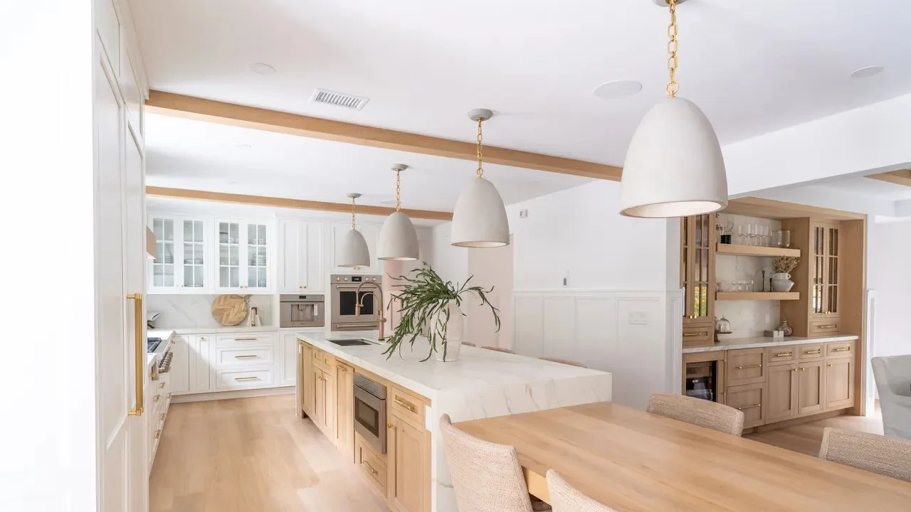 Image may contain Indoors Interior Design Kitchen Wood Home Decor Dining Table Furniture Table and Architecture