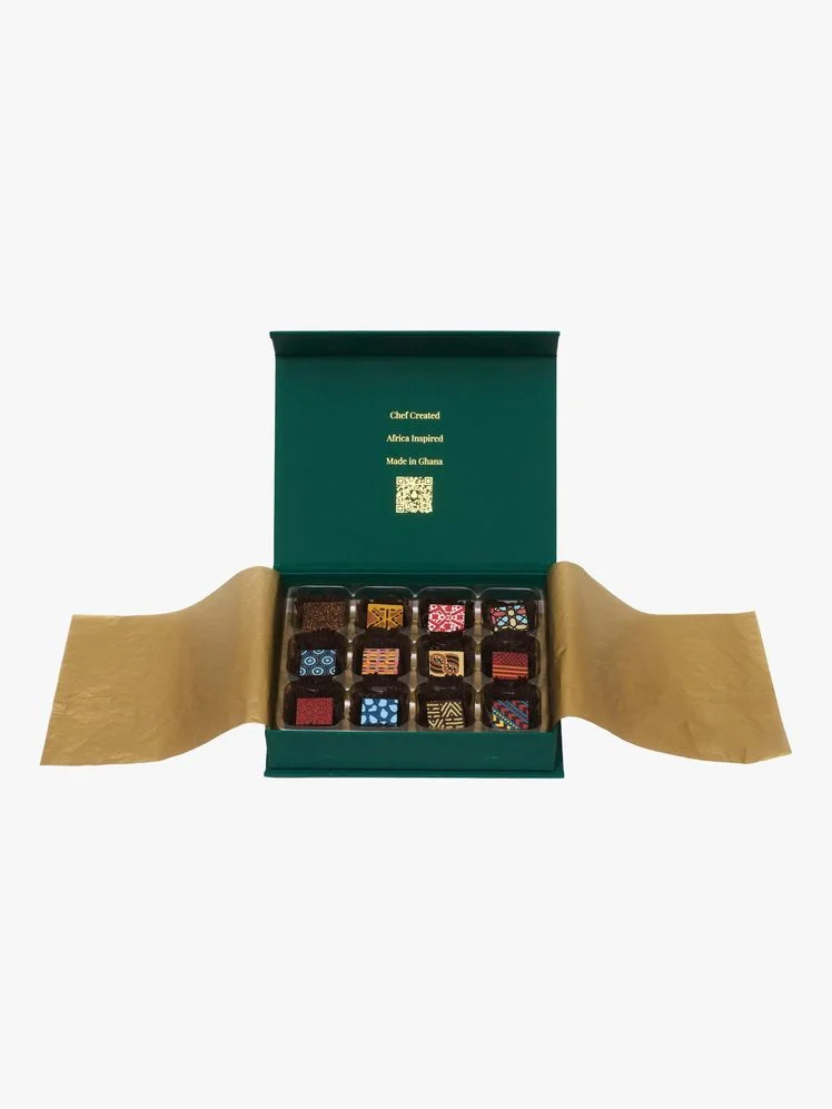 Image may contain: Accessories, Formal Wear, Tie, Chocolate, Dessert, and Food