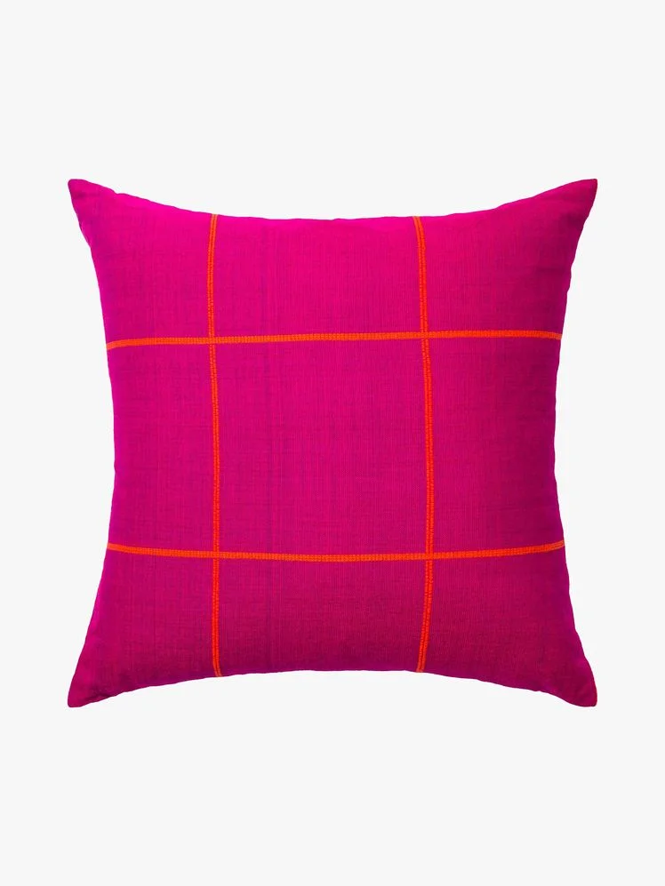 Image may contain: Cushion, Home Decor, Pillow, Clothing, and Skirt