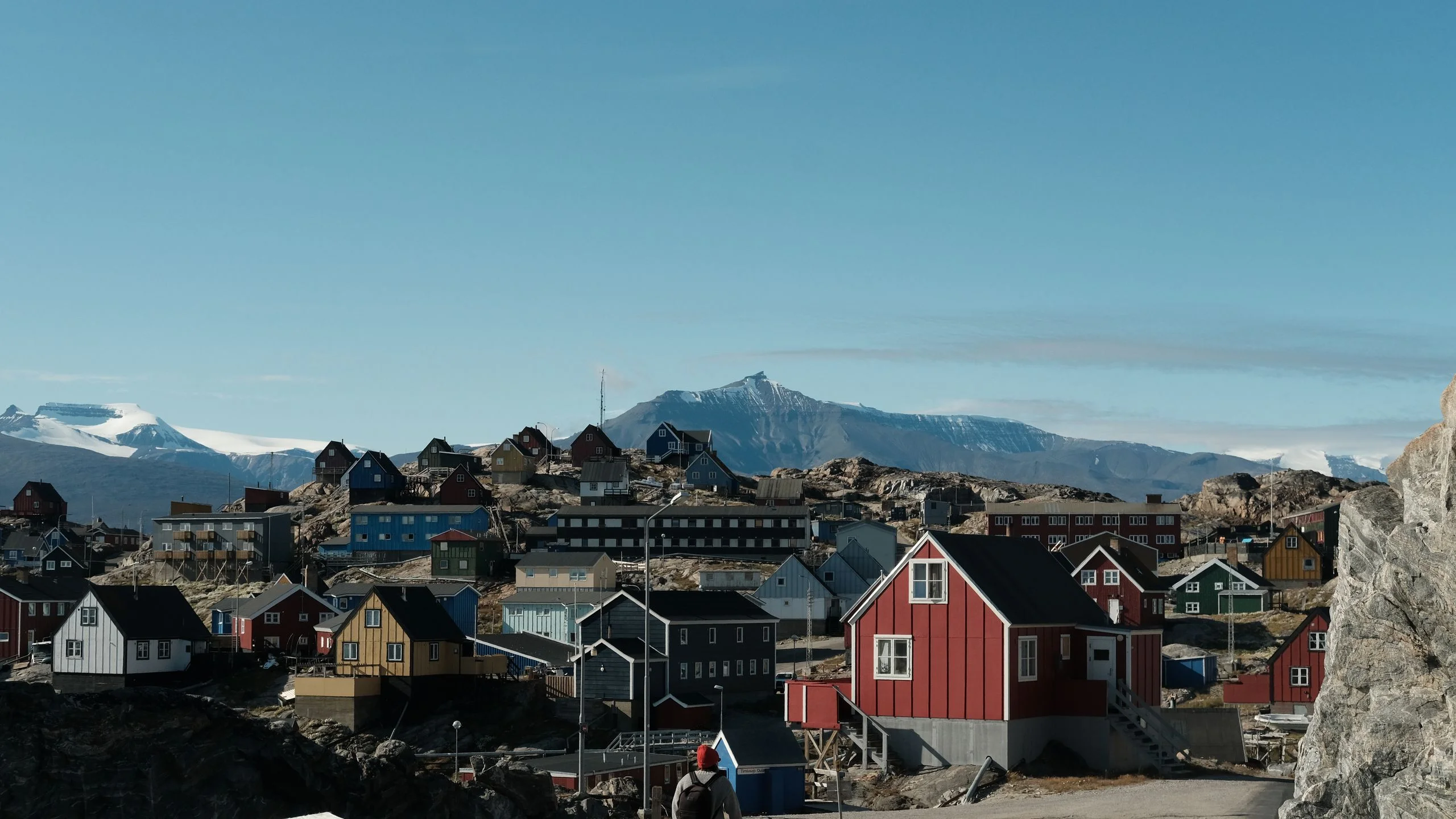 Image may contain Neighborhood Architecture Building Cityscape Urban Person Nature Outdoors Backpack and Bag