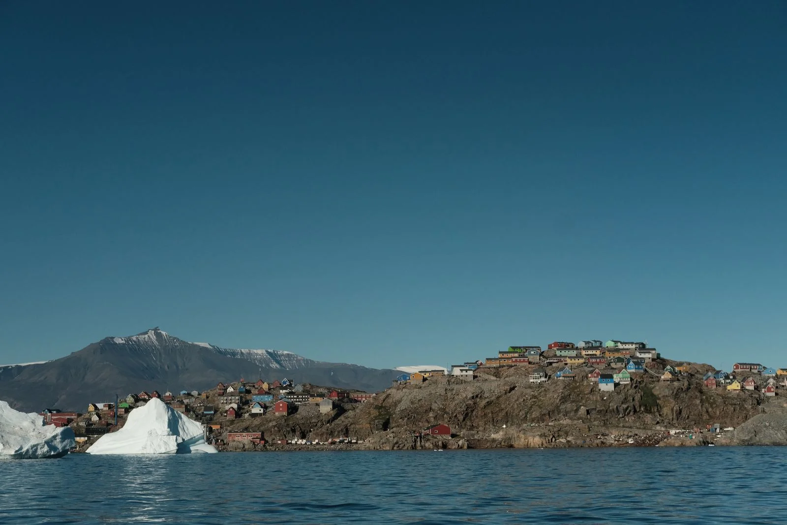 Image may contain Architecture Building Cityscape Urban Nature Outdoors Sea Water Rock Animal Canine and Dog