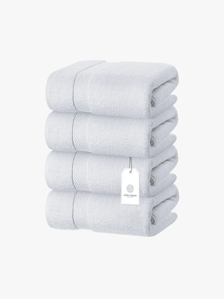 Stack of folded white towels.