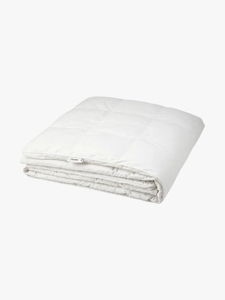 Image may contain: Blanket, and Furniture