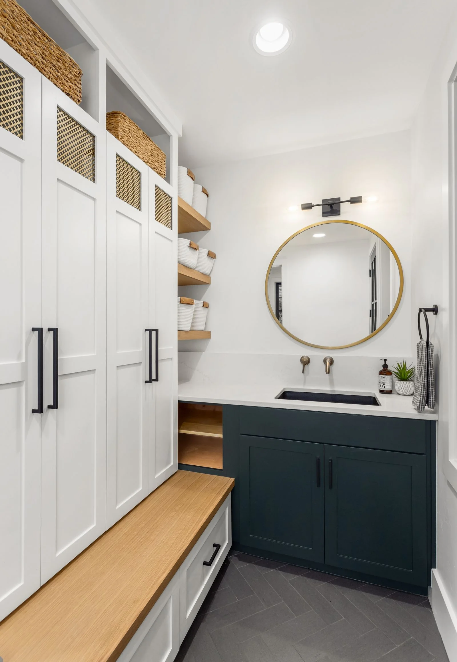 Image may contain Indoors Interior Design Corner Sink Sink Faucet Furniture and Wood